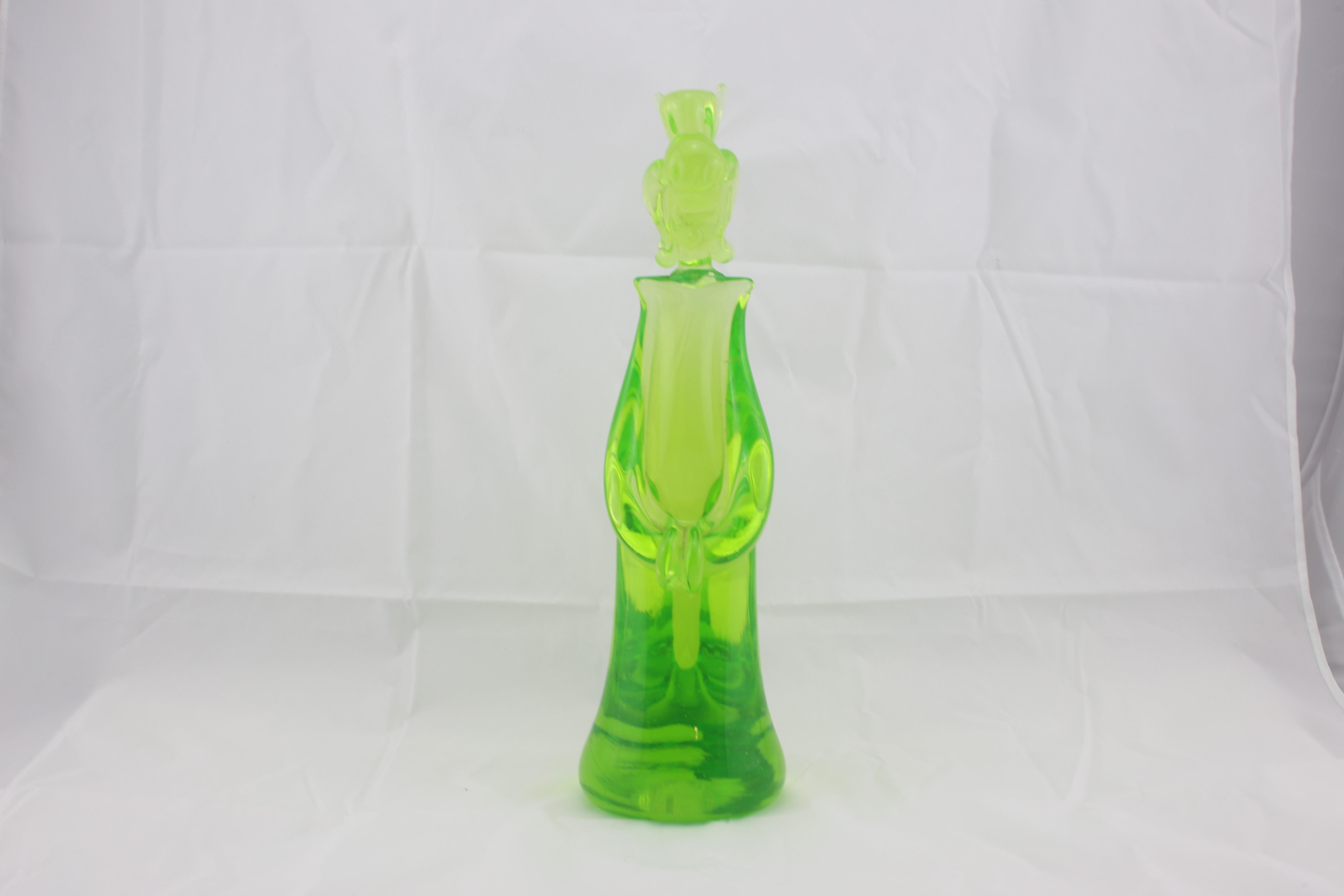 Murano green Geisha in Murano glass in a vivid green color.
In style Mid century Modern from Italy Murano 1960s.