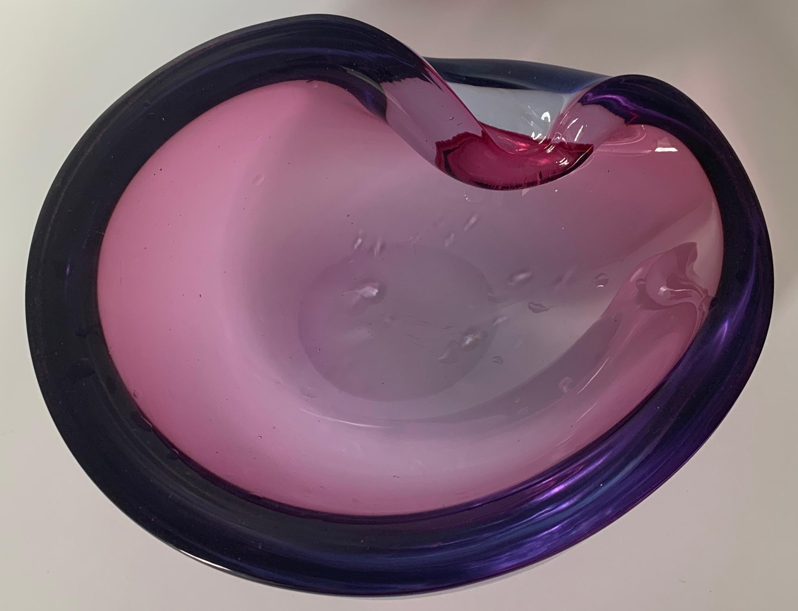 Midcentury Murano Seguso attributed ashtray. Amethyst purple with blue and pink detailing. No makers mark or signature.