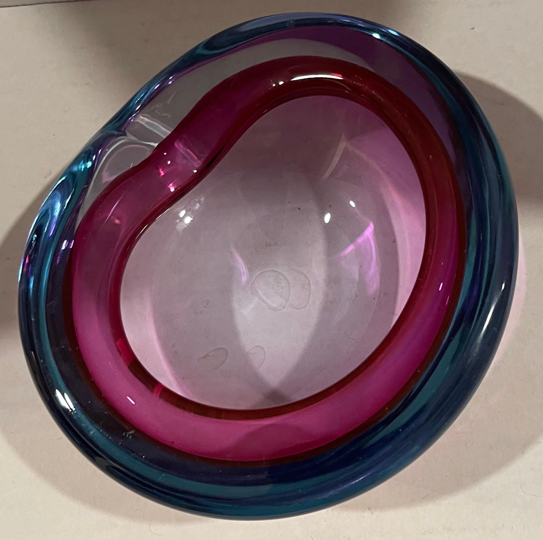 Midcentury Murano Seguso attributed ashtray. Amethyst purple with blue and pink detailing. No makers mark or signature.