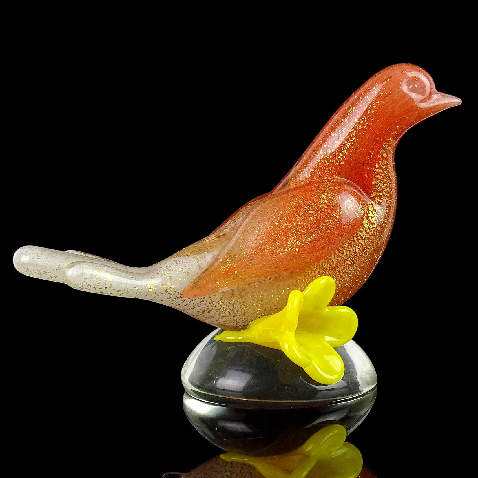 Beautiful vintage Murano hand blown orange, white and gold flecks Italian art glass bird with flower sculpture / paperweight. Documented to designer Archimede Seguso. The piece has an opaline quality and is profusely covered in gold leaf throughout.