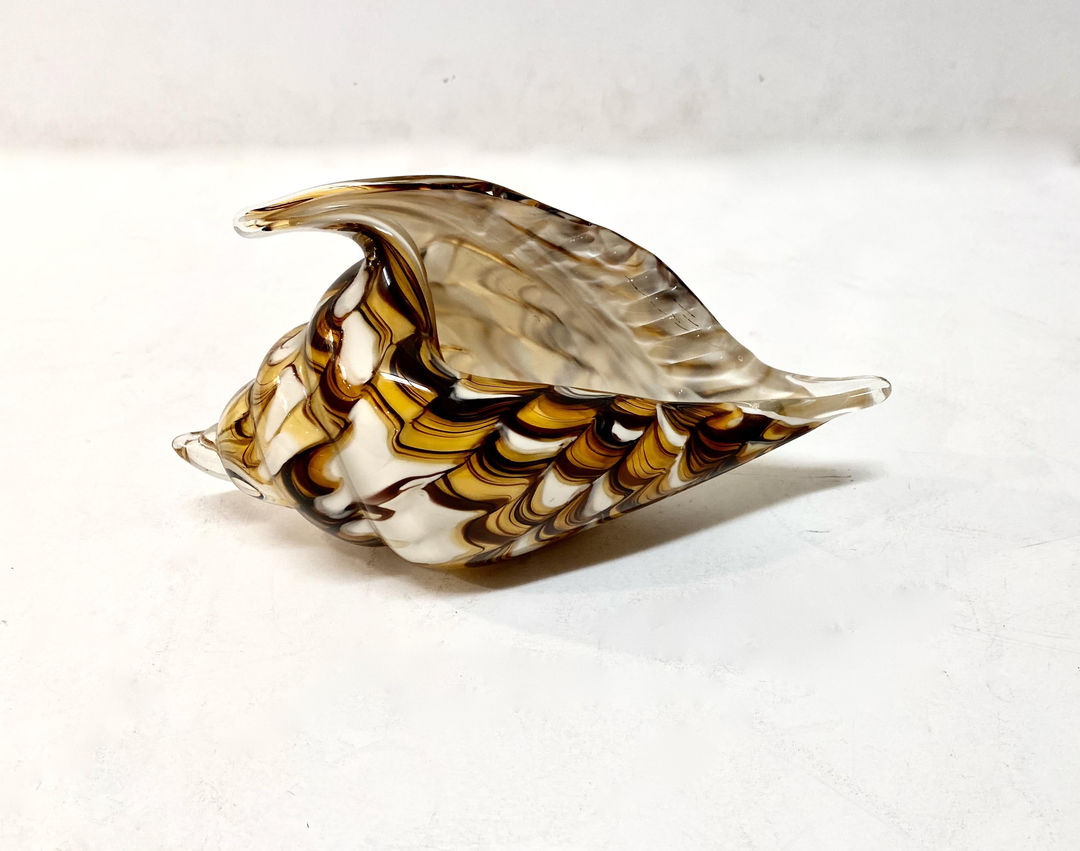 Beautiful mid-century murano shell-form sculpture or dish in rich deep chocolate brown, toffee and ivory with a clear casing. The impressive size of the shell combined with the multicolor design makes this a stand-out accent piece for table top or