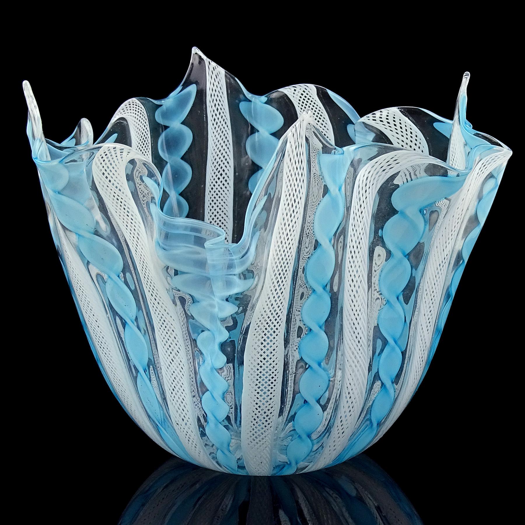 Beautiful vintage Murano hand blown blue and white ribbons Italian art glass handkerchief / fazzoletto vase. Created in the manner of Venini and the Fratelli Toso companies. The vase is made with twisting sky blue Latticino pieces and white net