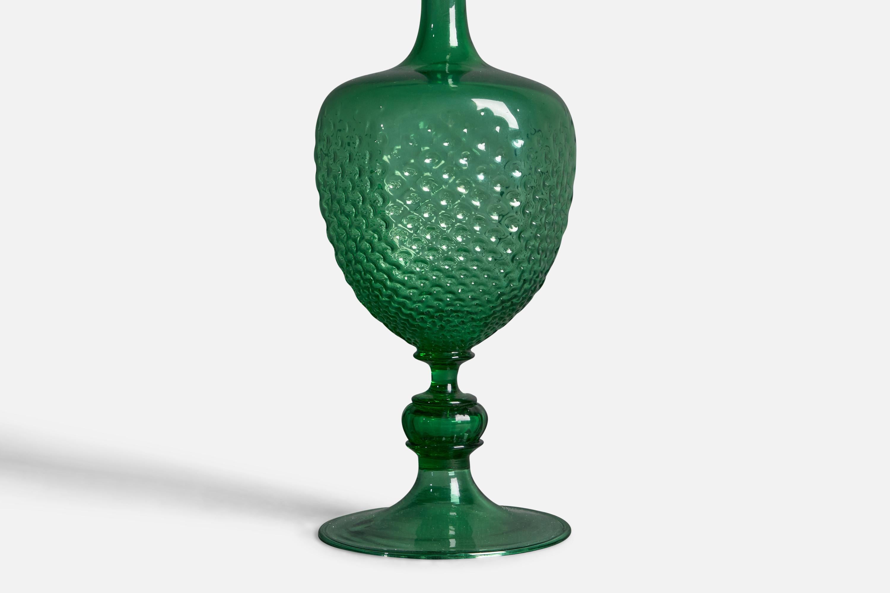 A footed green Murano glass 