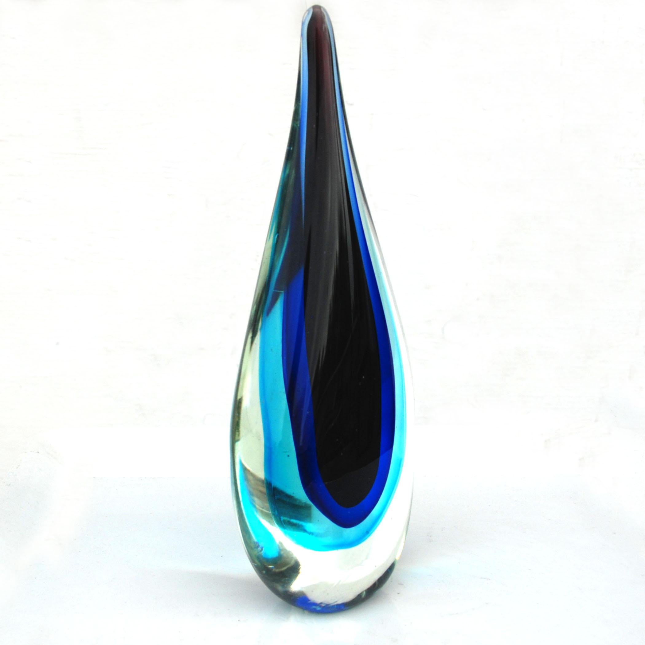 Sommerso Art Glass attributed to Flavio Poli 

Sommerso glass piece attributed to midcentury artist Flavio Poli. 
Sommerso technique was pioneered by Murano Glass artists in the 1930s which called for bright colors and innovative designs.

