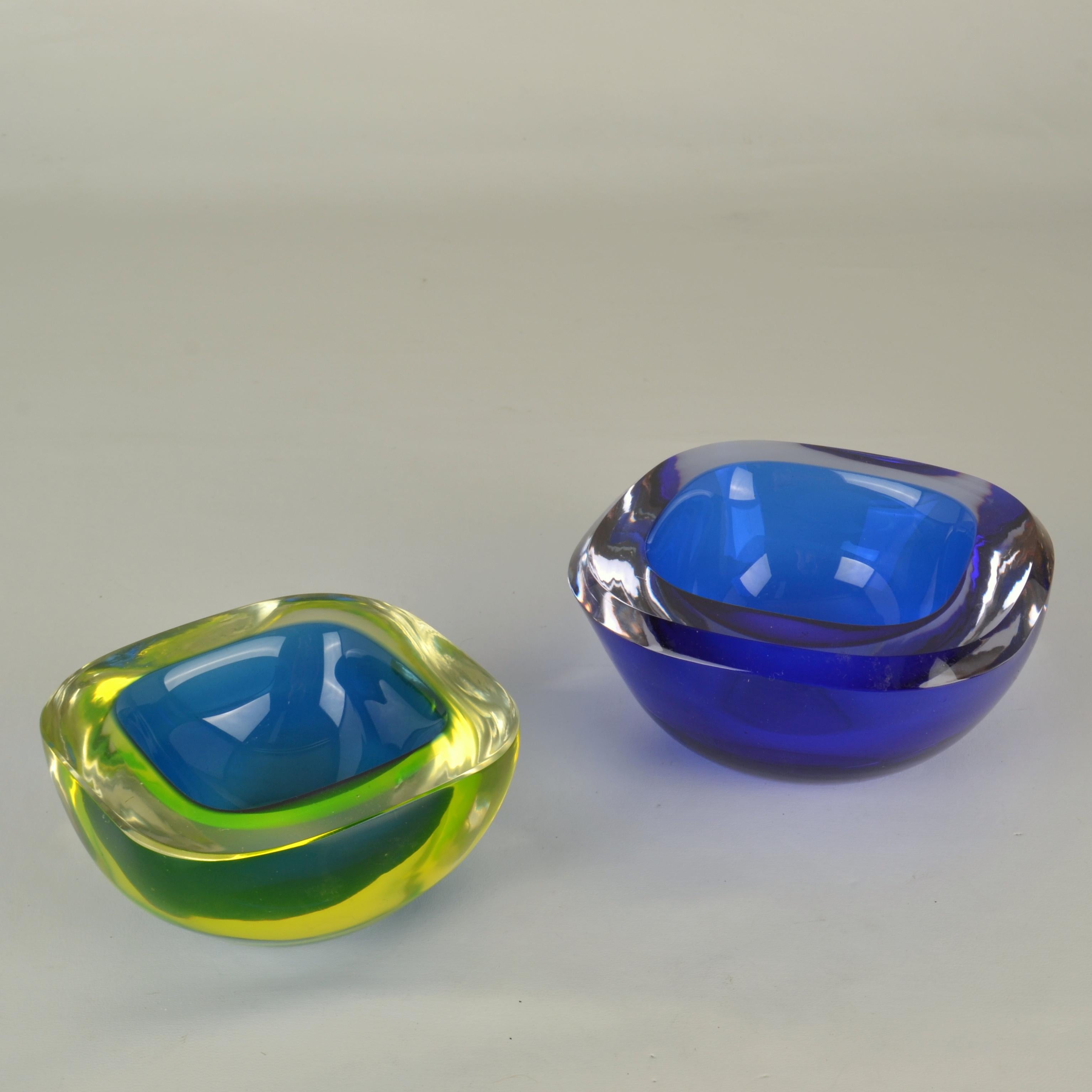 Glass bowls square shape by Flavio Poli for Seguso 1960s in deep blue. The bowls are hand blown, known as Venetian Sommerso, made in Murano, Venice, Italy. 
The bowls a combination of deep blue and acid yellor (which is rare) encased in clear