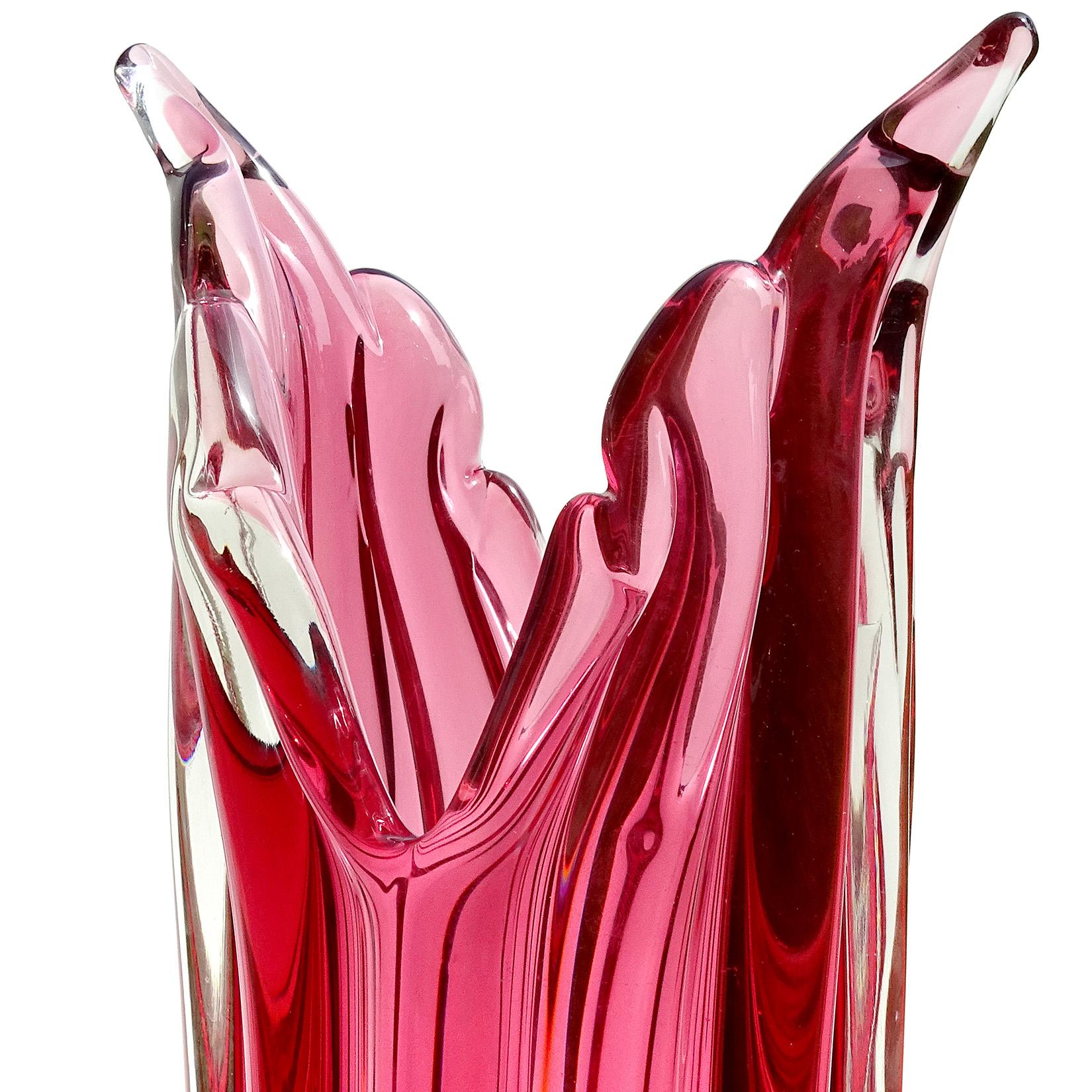 Murano hand blown Sommerso deep pink / red Italian art glass flower vase. Attributed to designer Alfredo Barbini. The piece has a ribbed body, with flared winged rim. Measures: 11 3/4