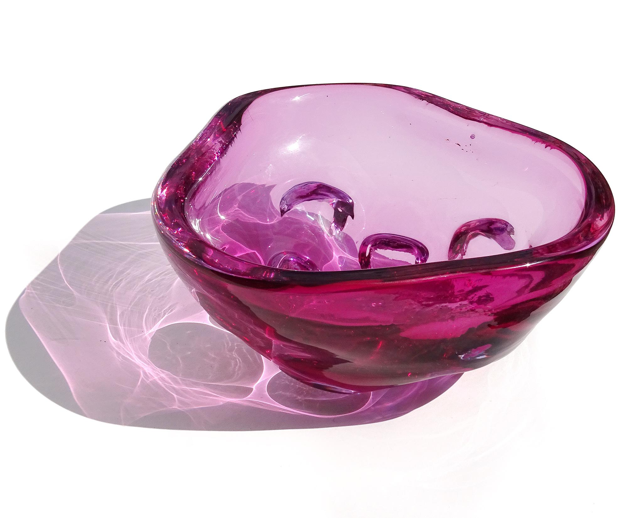 Beautiful vintage Murano hand blown vibrant Sommerso fuchsia purple Italian art glass triangular shaped bowl. The piece has indented circle decoration on the outside surface. Can be used as a display piece on any table. Use it as a catchall, or