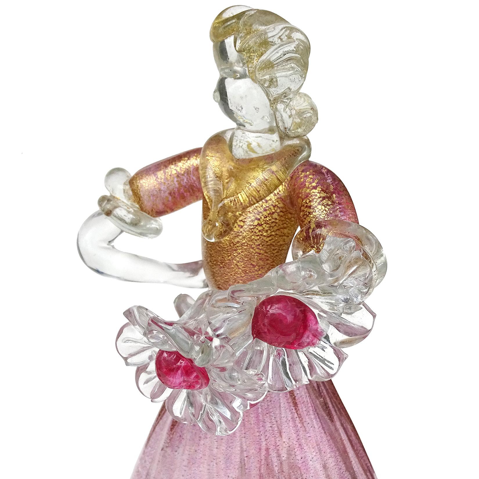 Beautiful vintage Murano hand blown Sommerso pink with gold flecks Italian art glass man and woman farmer / gardener sculptures. Attributed to designer, and Master glass artist Alfredo Barbini. The color is pink, but they have tiny little blue color