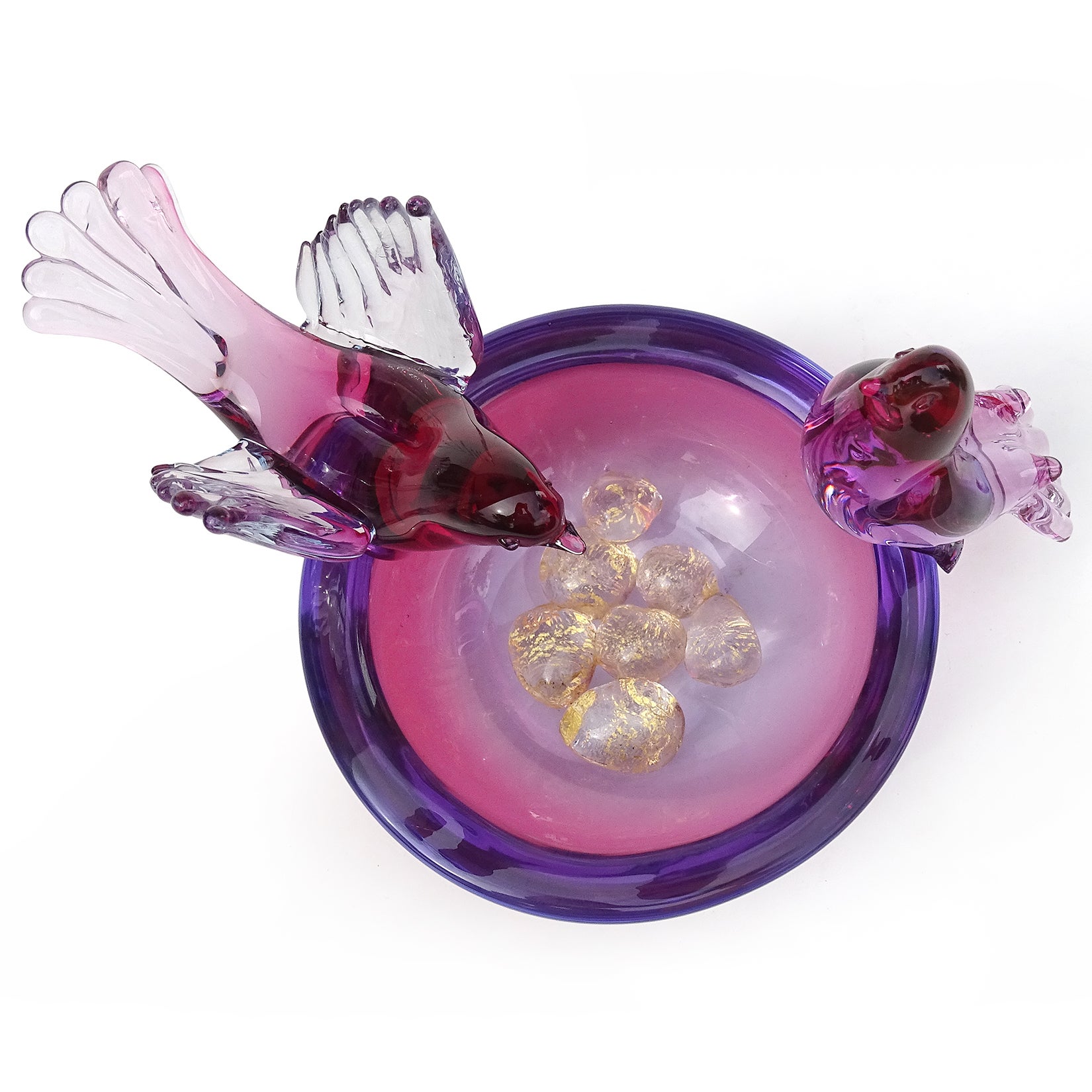 Beautiful vintage Murano hand blown Sommerso red, amethyst purple, light blue and gold flecks Italian art glass birds on bowl, looking over their nest with eggs. Attributed to the Salviati company, and designer Alfredo Barbini. The male and female