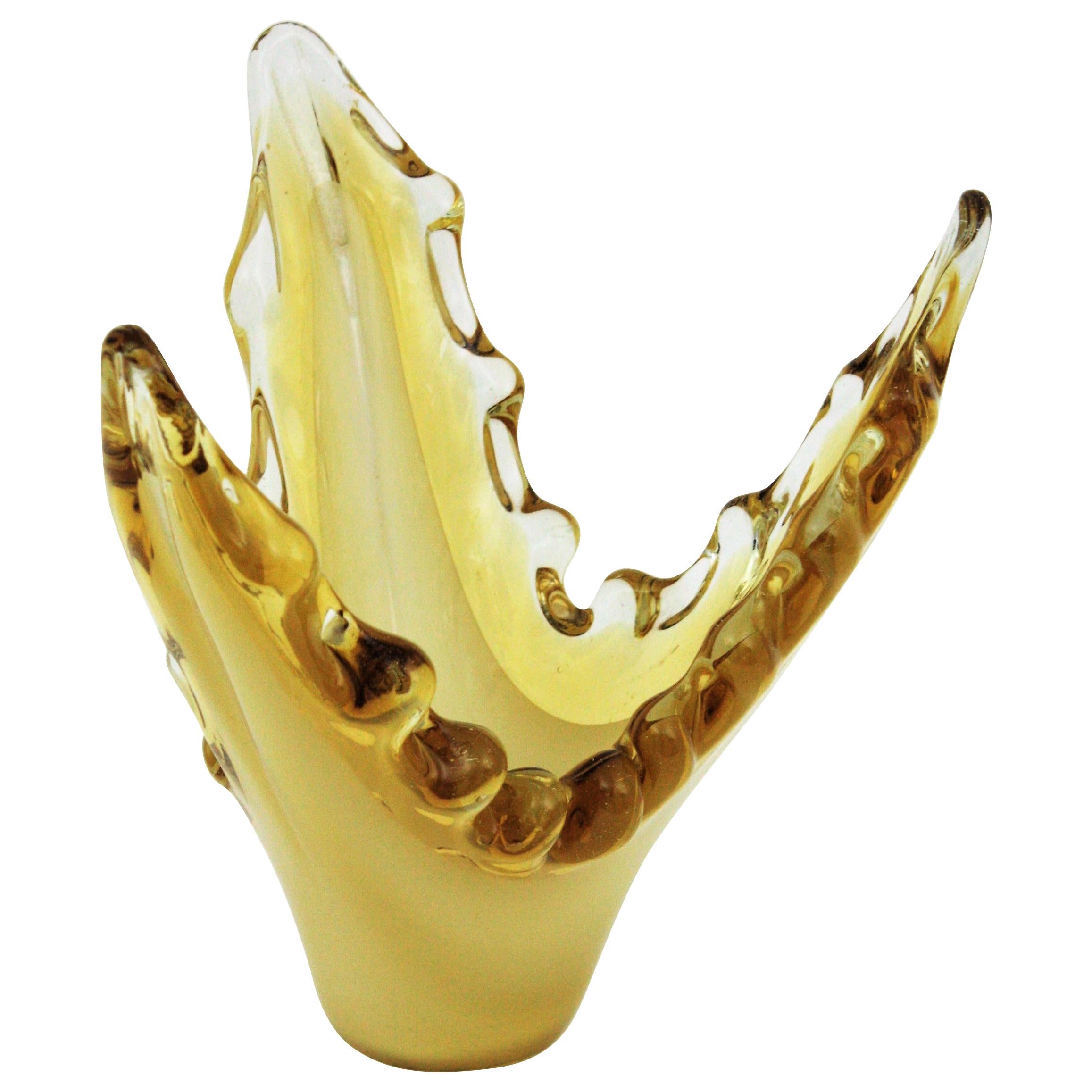 Elegant hand blown Sommerso and lattimo yellow Murano glass vase / centerpiece, Italy, 1950s.
Triple cased glass (yellow, over white lattimo glass over yellow glass). It has an scalloped rim with amber accents.
This Murano glass vase is perfect to