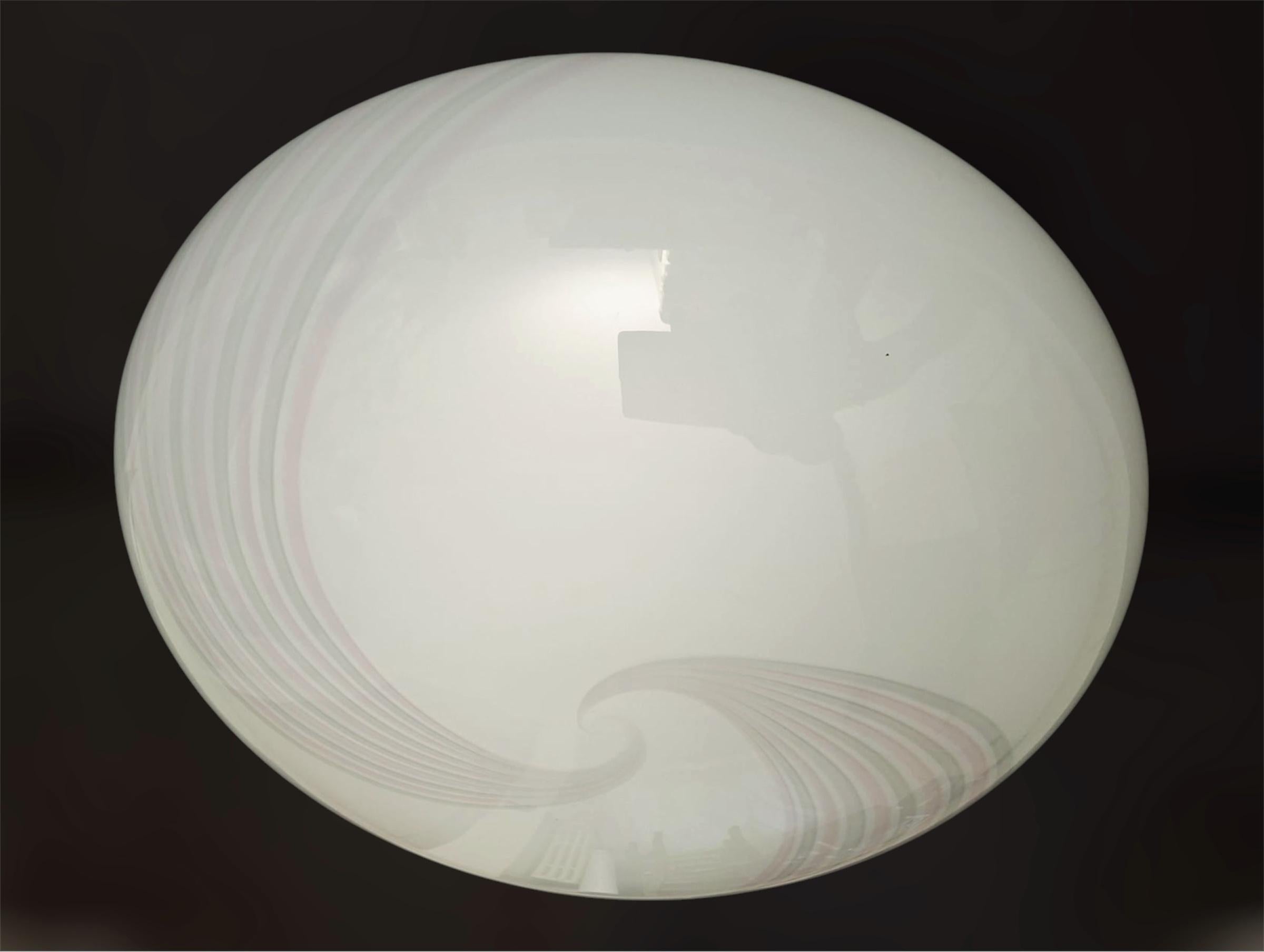 Vintage Italian flush mount or wall light of a frosted Murano glass shade with elegant pink and gray spirals / Made in Italy, circa 1960s
Measures: diameter 20 inches, height 8 inches
3 lights / E26 or E27 type / max 60W each
1 available in stock in