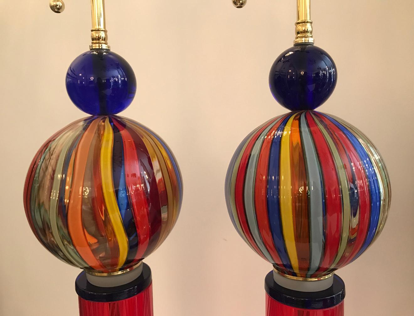 One of a kind Murano glass all around table lamps. Featuring a Cenedese (canne) glass ball as a main element. Newly wired and adapted with brass double sockets and silk cord.