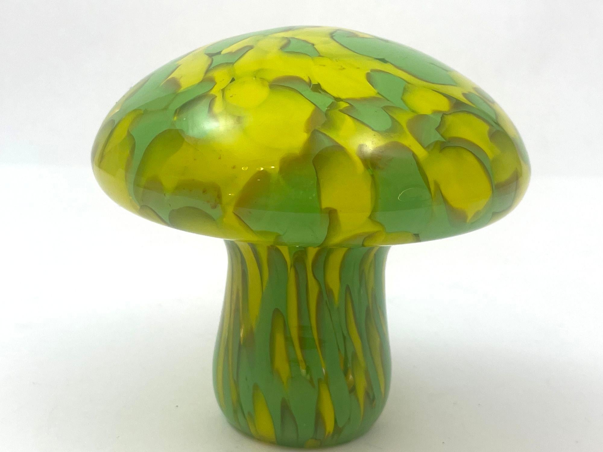 Murano Style Italian Art Glass Mushroom Toadstool Paperweight Green and Yellow 1980s.
Beautiful vintage Murano style hand made yellow with green spots Italian art glass mushroom toadstool paperweight.
It is made with thick glass, and it is heavy for