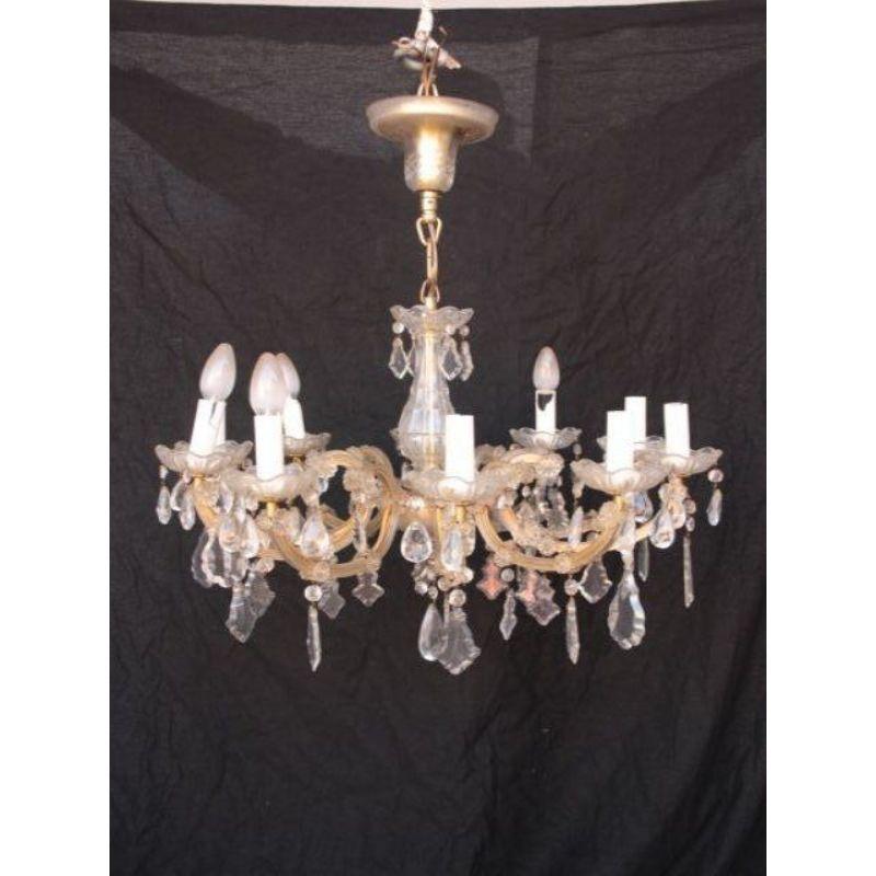 1960 Murano style pendant chandelier with 10 lights. Dimension height 80 cm for a diameter of 65 cm.

Additional information: 
Material: Bronze, glass & crystal
Style: 1940s to 1960s
Artist: Murano.