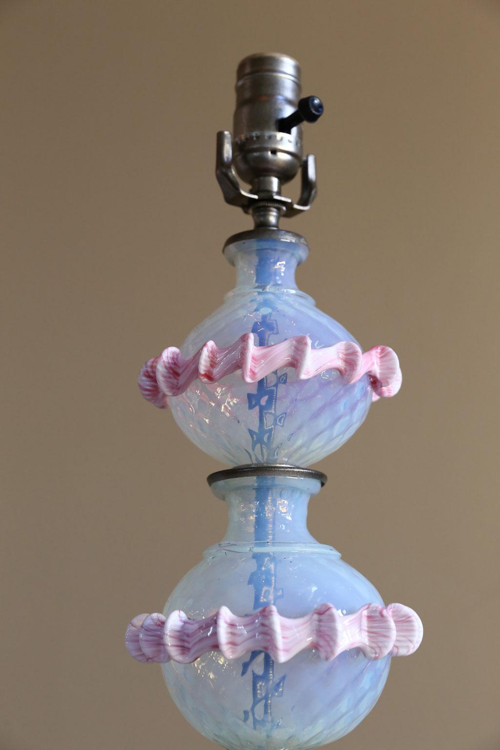 This charming table lamp was made from vintage Murano parts from 1960s. The hand blown glass is a combination of a milky, opaline glass with pink decoration. The lamp has been made in the US from Italian parts. There is just one of this item. Parts