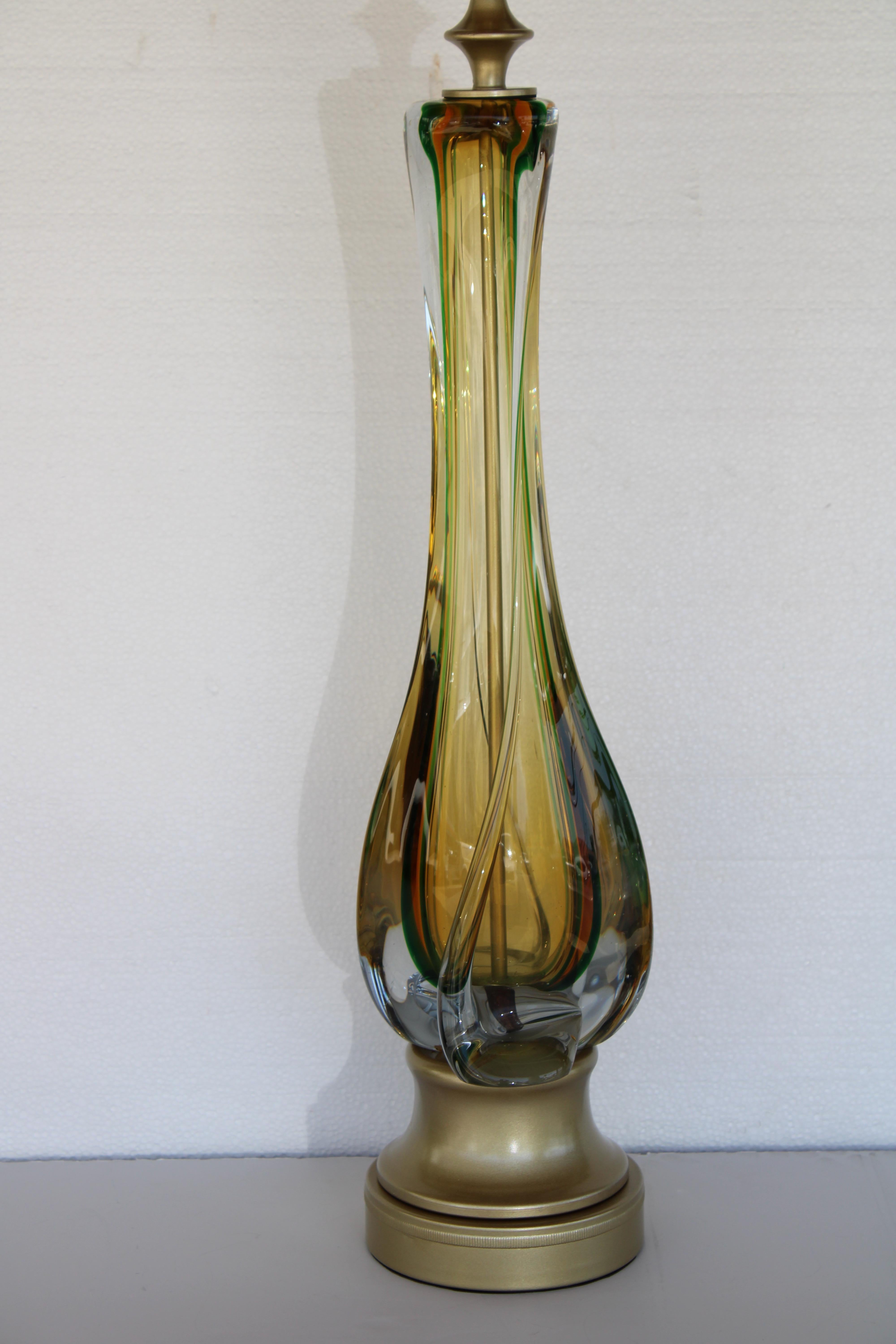 Elegant Murano glass lamp with various shades of green, orange and yellow. Glass portion is 21.5