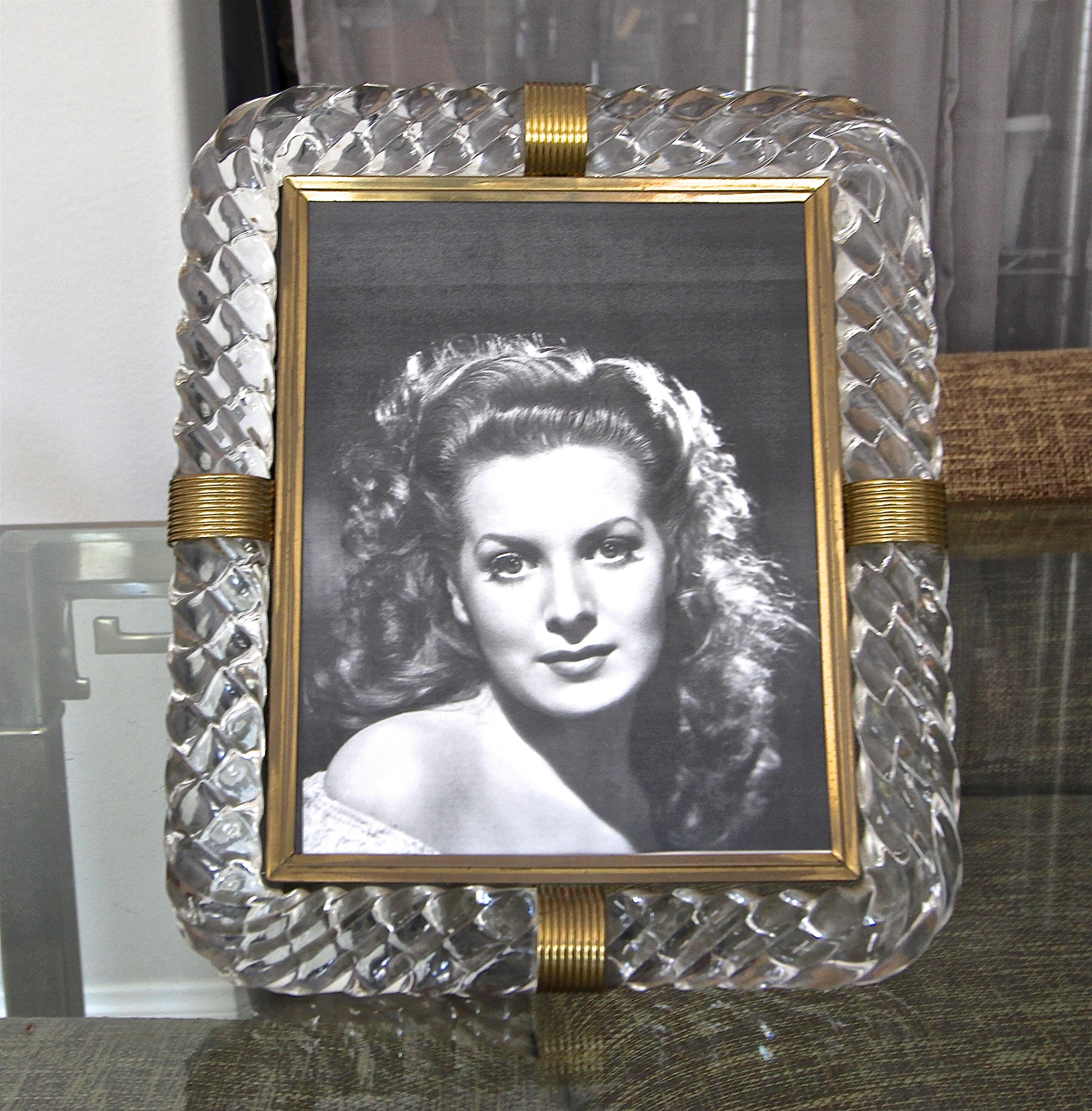 A beautiful 1940s Murano Italian thick twisted glass rope picture frame with brass trim detailing. In the manner of Venini.
