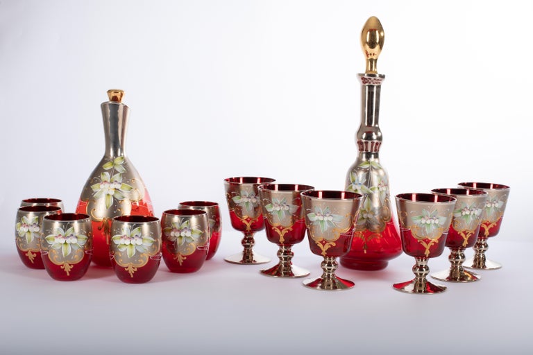 1295 MURANO is proposing this beautiful hand made TRE FUOCHI Collection tumblers and pitcher edition, 

two Complete Set, for a total of 14 pieces: 
6 tumblers
6 goblets
2 bottles,

hand blown emerald green glass, and hand made Fire Enamel