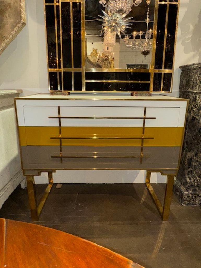 Modern Italian designer glass and brass tri-color chest of drawers. Circa 2000. Perfect for today's transitional designs! 40w x 20d x 34h