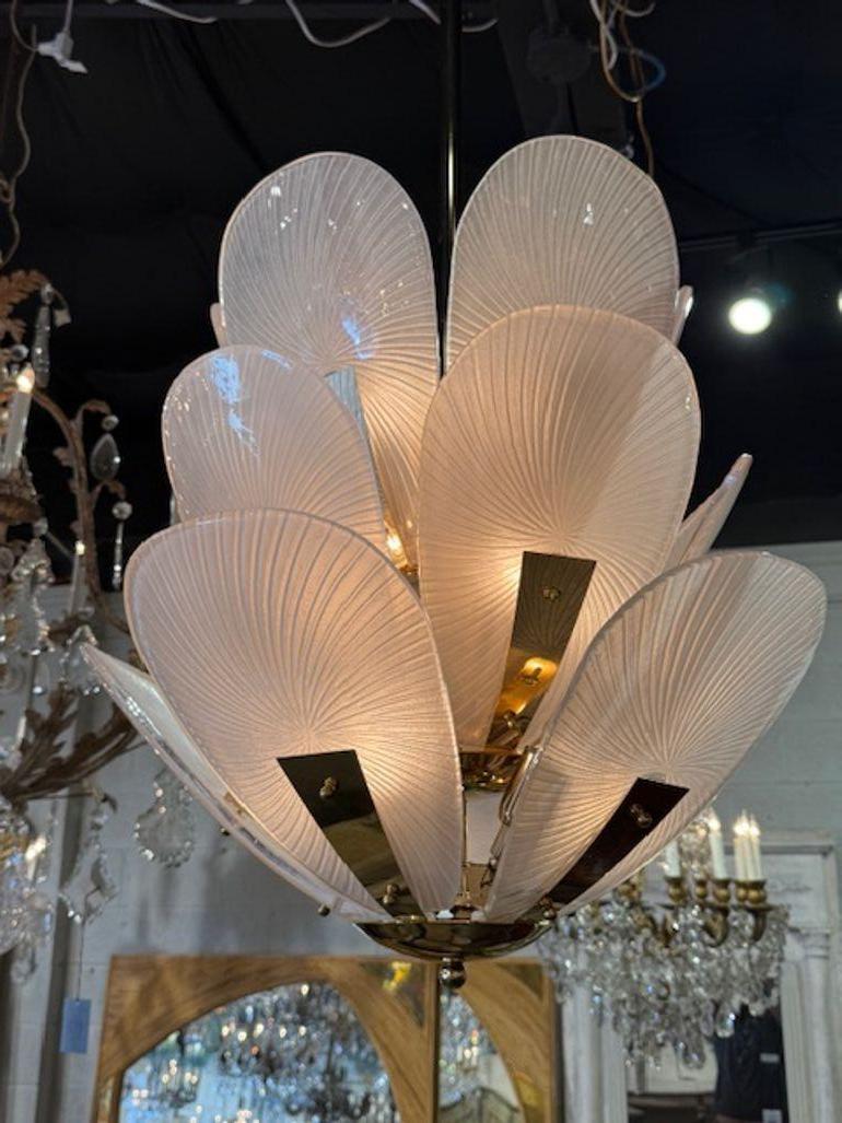 Gorgeous modern Murano glass and brass tulip chandelier. These chandeliers are perfect for layering elegance into traditional, Art Deco, or Hollywood Regency spaces.  24w x 41h 