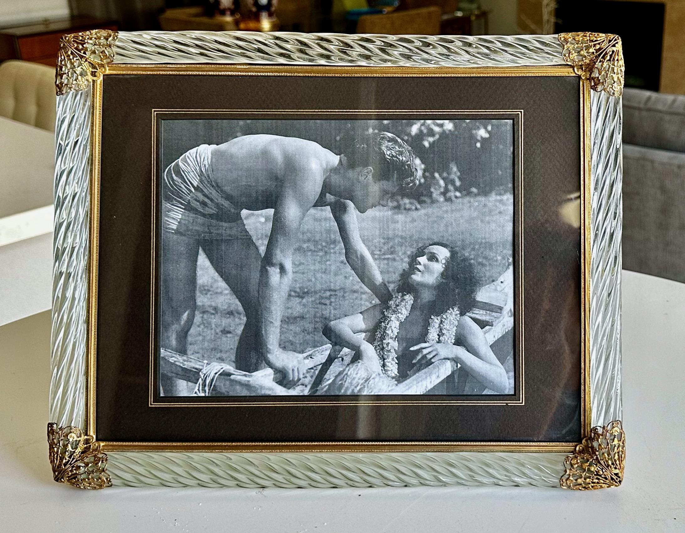 1950s Murano Italian twisted glass rope table top picture frame with decorative pierced brass trim detailing. The easel backing allows for horizontal viewing only.