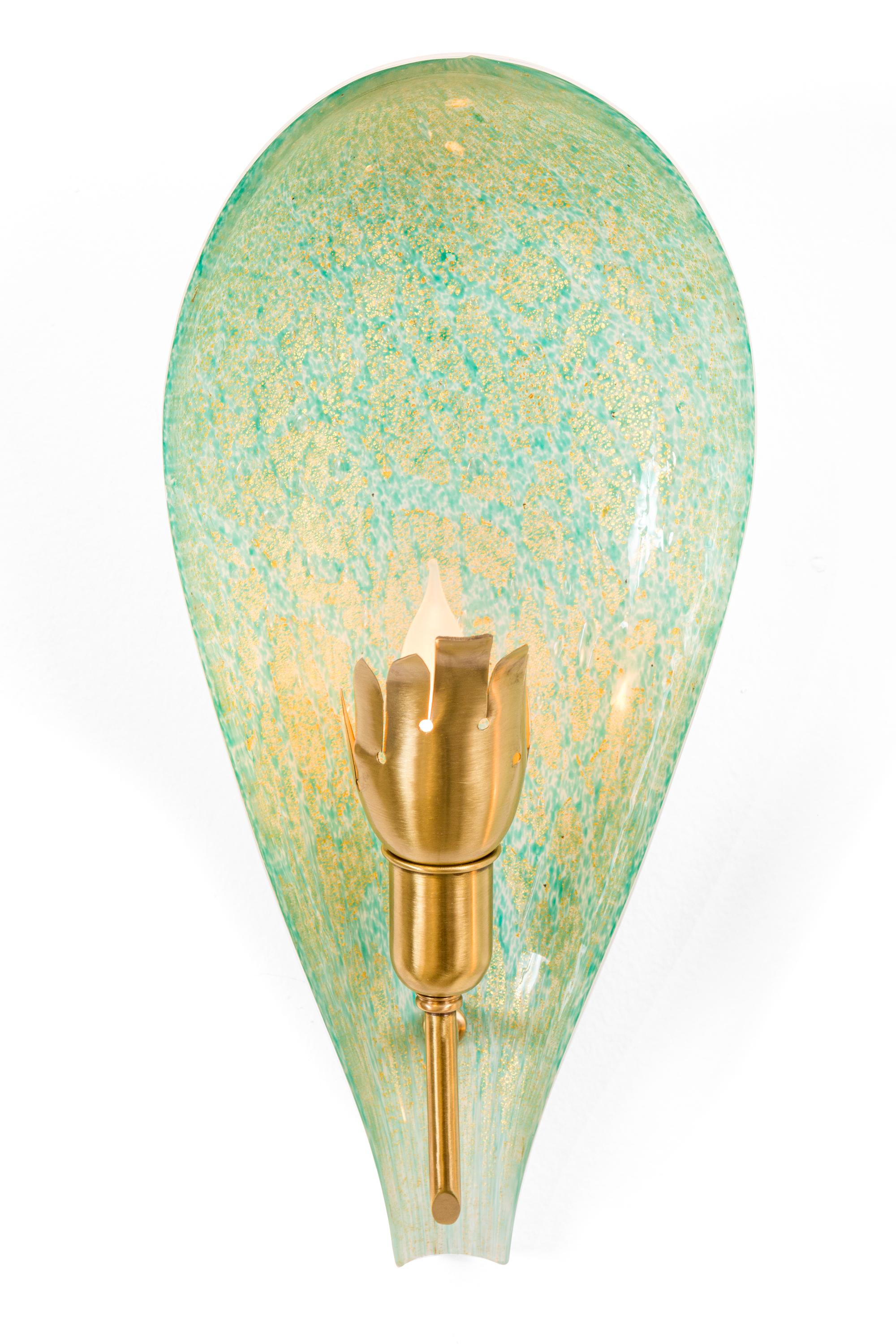 A lovely pair of Italian green Murano glass sconces with gold highlights.