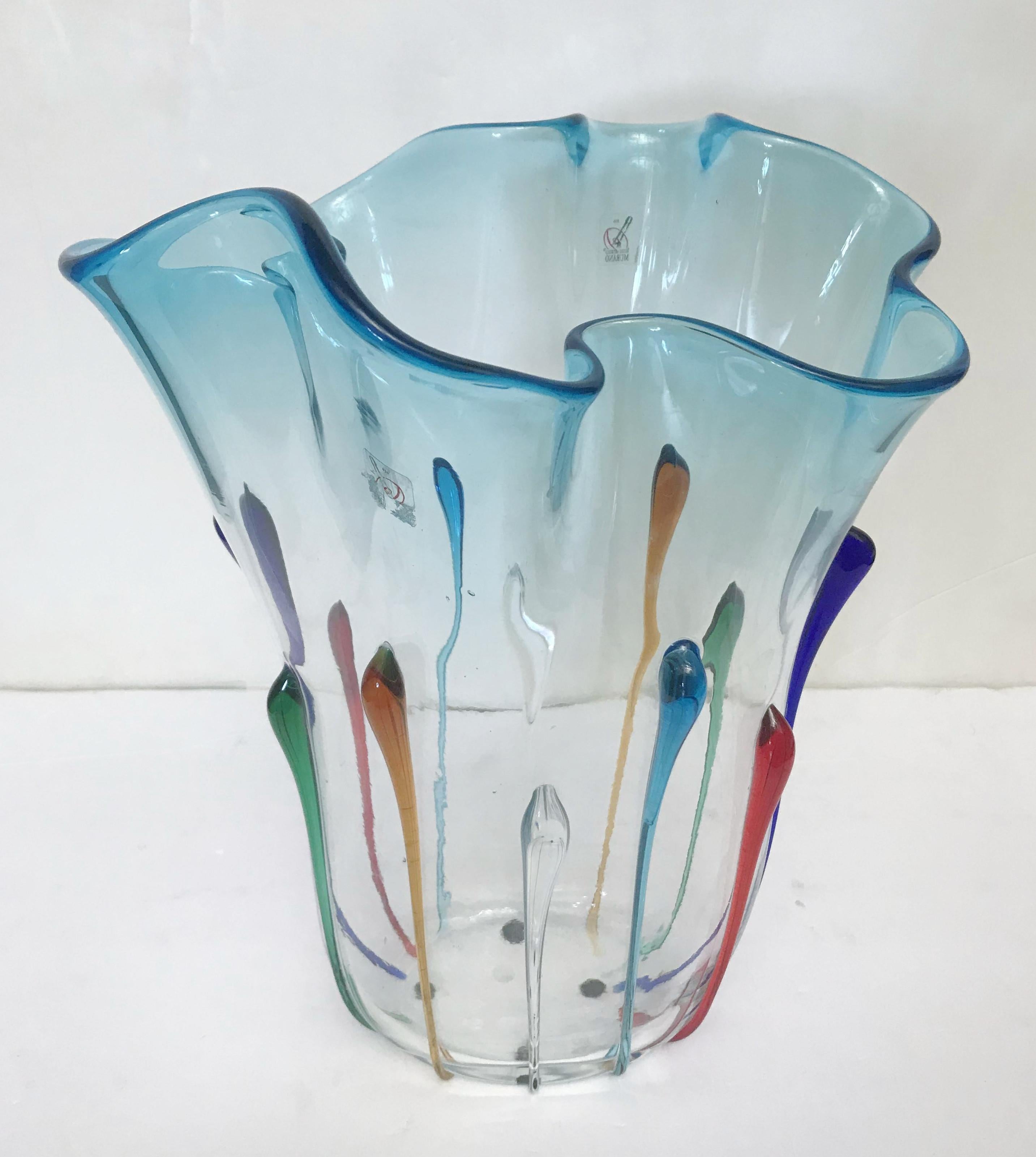 Italian hand blown Murano glass vase decorated with rainbow colored glass drops by Camozzo / Made in Italy circa 1980s
Mark engraved on the base
Measures: Height 15 inches, width 10 inches, depth 8 inches
1 in stock in Palm Springs currently ON 40%