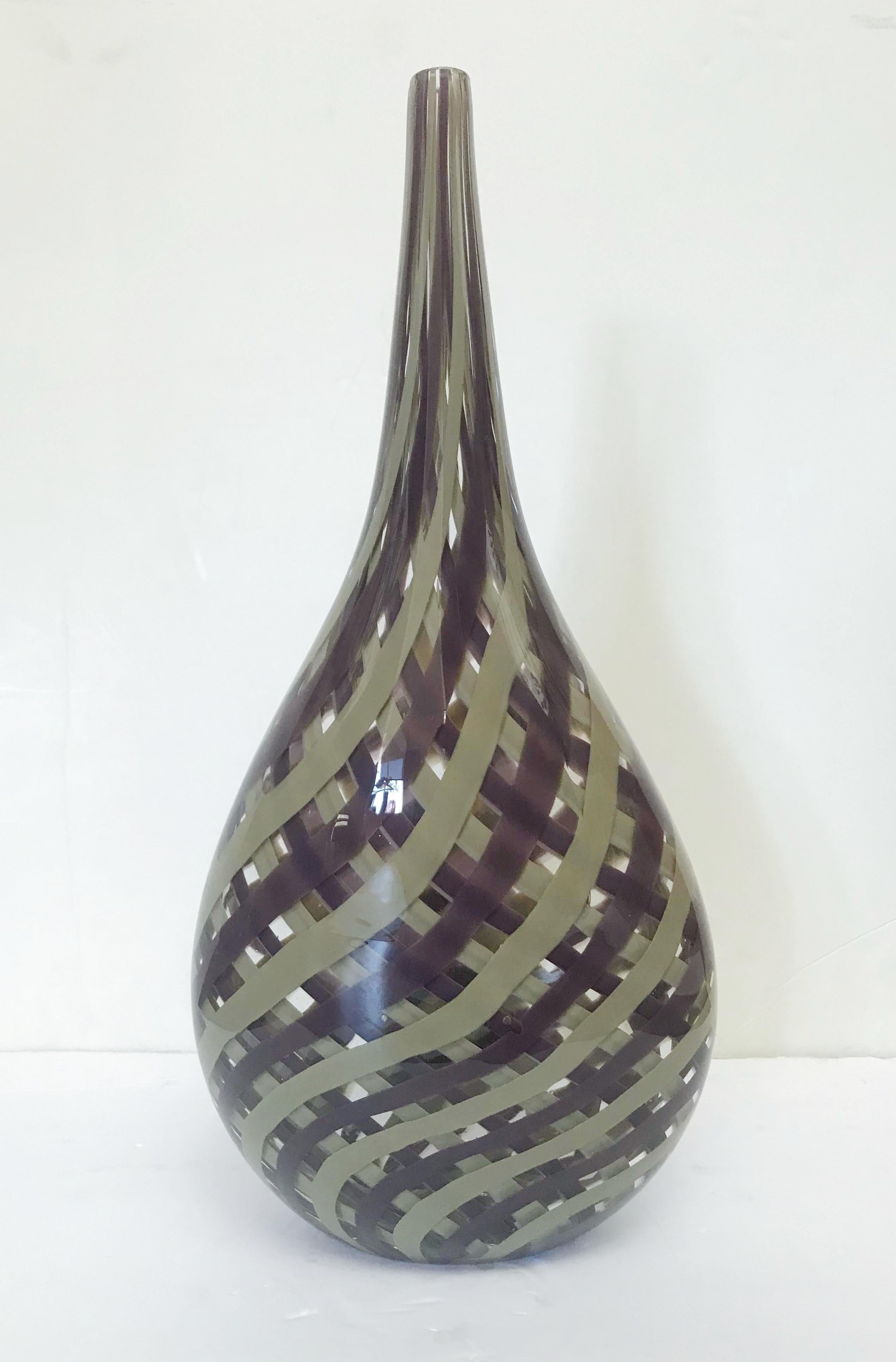 Italian Murano glass vase hand blown with purple and mustard stripes interlacing one other / Made in Italy, circa 1970s
Murano mark engraved on the base
Measures: Height 20 inches, width 9 inches, depth 5 inches
1 in stock in Palm Springs currently