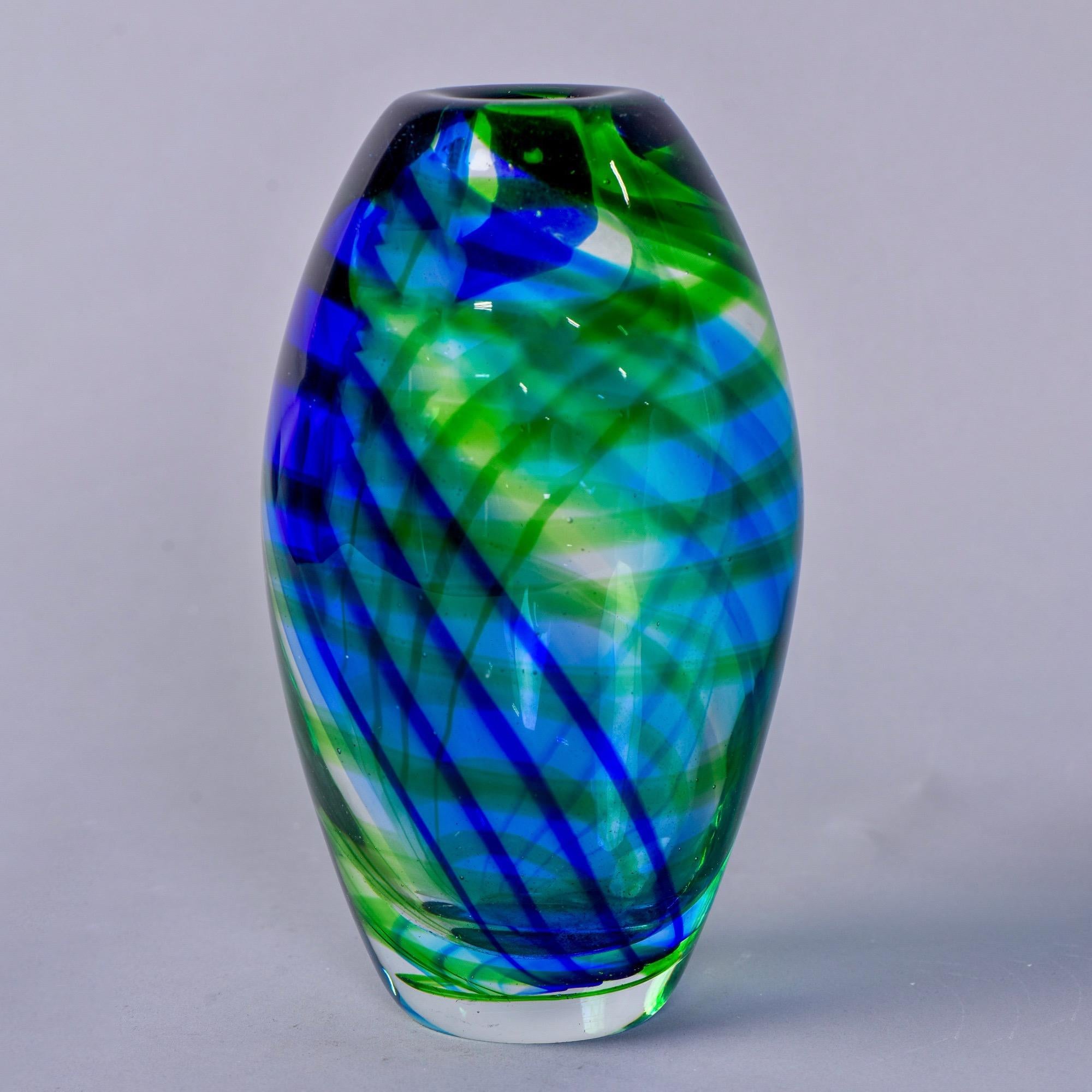 Modern Murano glass vase in heavy clear cased glass with wide, diagonal bands of sheer blue and green. Unknown Murano maker.