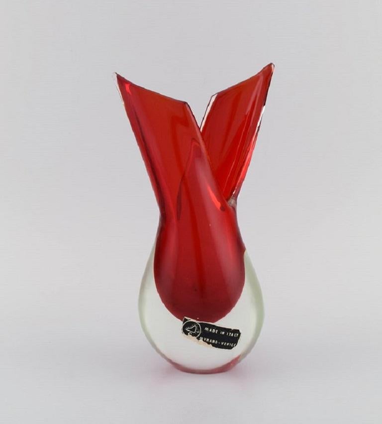 Murano vase in red and clear mouth-blown art glass. Italian design, 1960s.
Measures: 23 x 12.5 cm
In excellent condition.