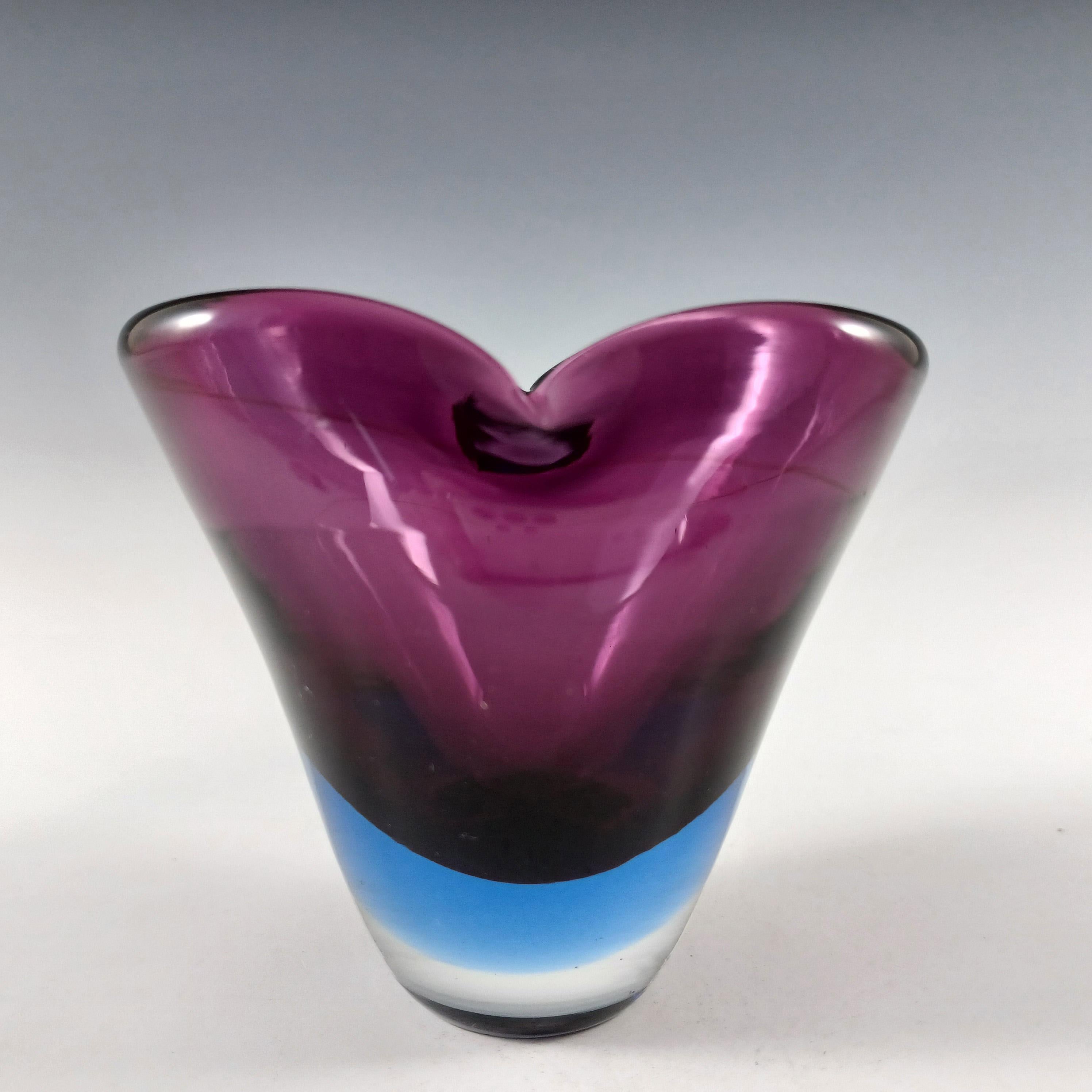 Here is a wonderful small Venetian glass vase, made on the island of Murano, near Venice, Italy. In a stunning combination of purple glass cased in blue glass, using the renowned Venetian sommerso technique.

Please note: Although this vase is