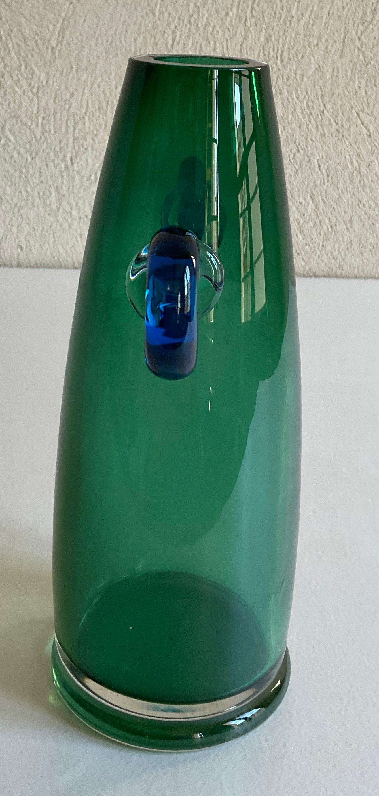 A fine hand-crafted Murano art glass vase, signed Marcello Furlou. 

This high quality Murano art glass vase is hand blown. It is designed in the manner of some Paolo Venini vases, most of which are circa 1956.

Measures: 
Depth 3.25 in. x Width