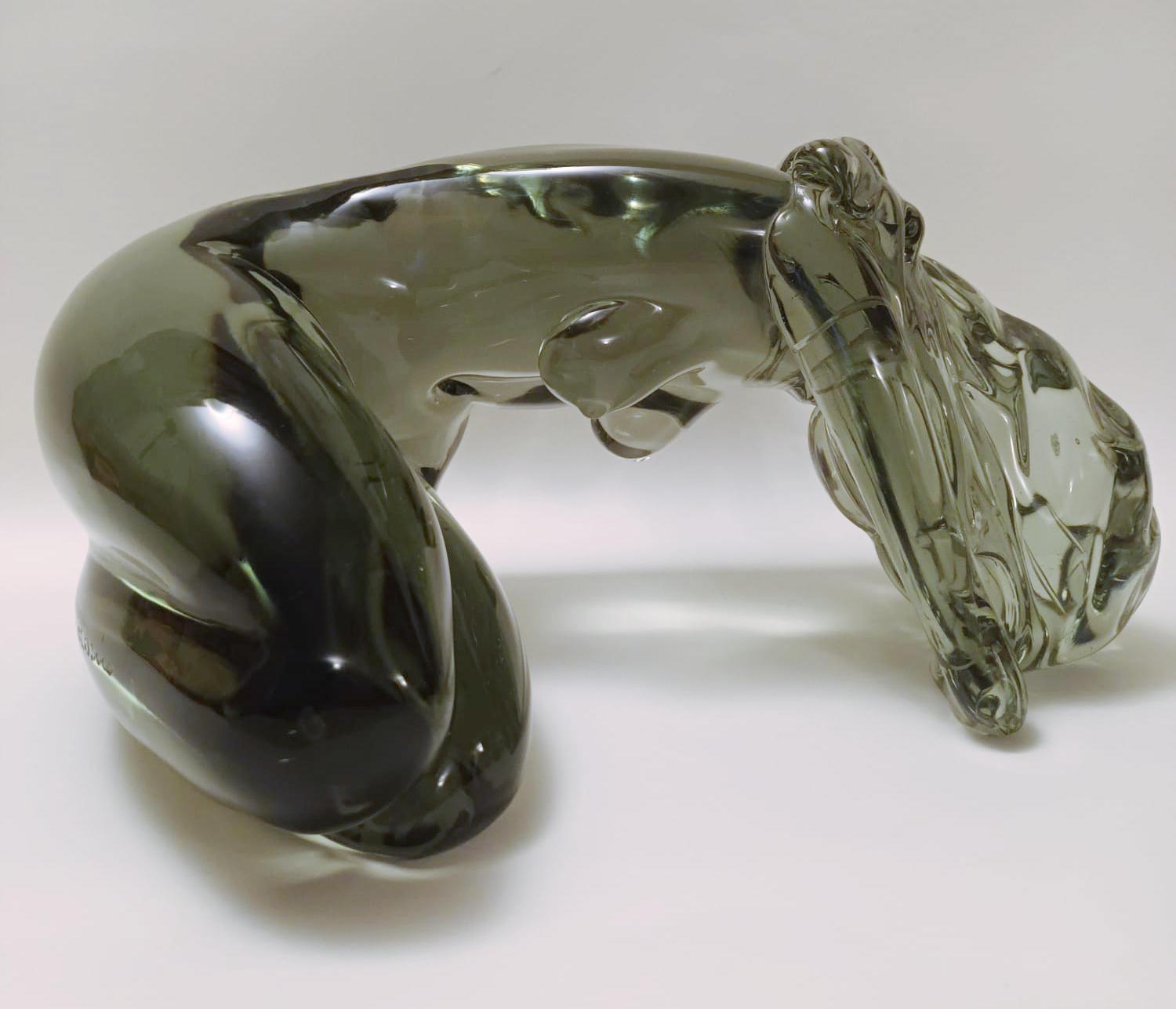 Vintage Italian smoky Murano glass sculpture depicting a woman with her head in her hands in a keeling position. 
It is made of solid glass, hand polished by Loredano Rosin / Made in Italy in 1970s
Original diamond-pointed signature on the