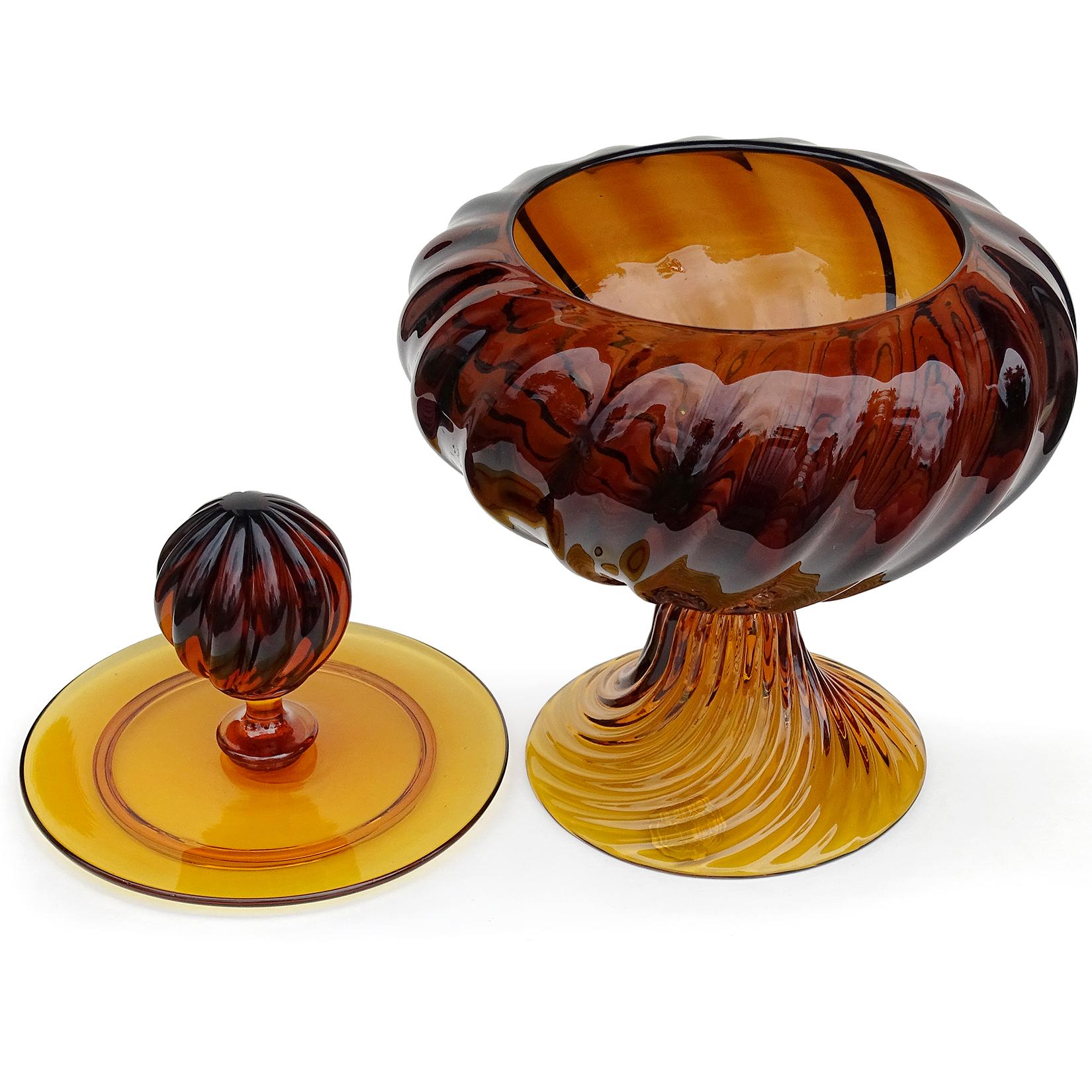 Beautiful vintage Murano hand blown dark amber honey Italian art glass cookie jar or container. In the manner of Empoli glass, with a 