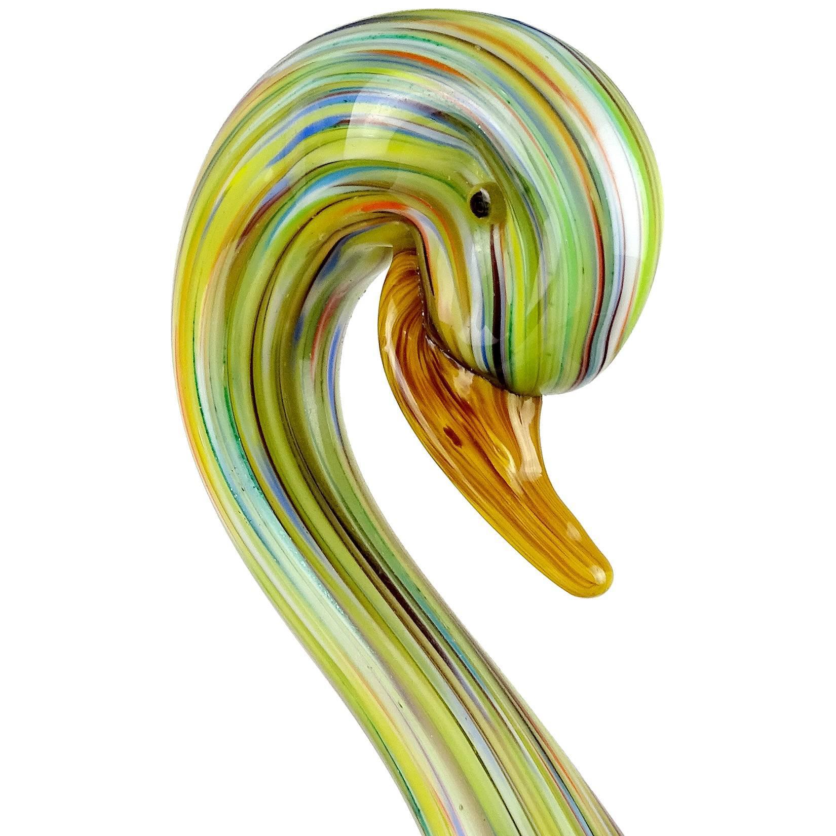 Colorful vintage Murano hand blown pulled feather Italian art glass swan bird sculpture / figure. Documented to Galliano Ferro for the Fornasa De Murano A L'Insegna Del Moreto Company, with label attached. The bird is made with many different bright