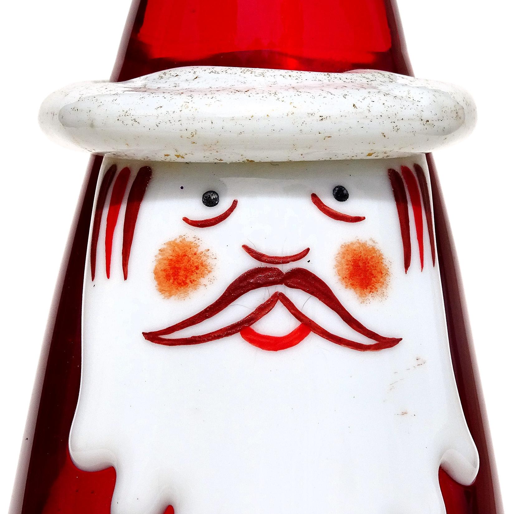 Beautiful vintage Murano hand blown red, white and gold flecks Italian art glass Santa Claus sculpture / paperweight. Documented to the Fornasa De Murano A L'Insegna Del Moreto, with original and intact label still attached. It also have a silver