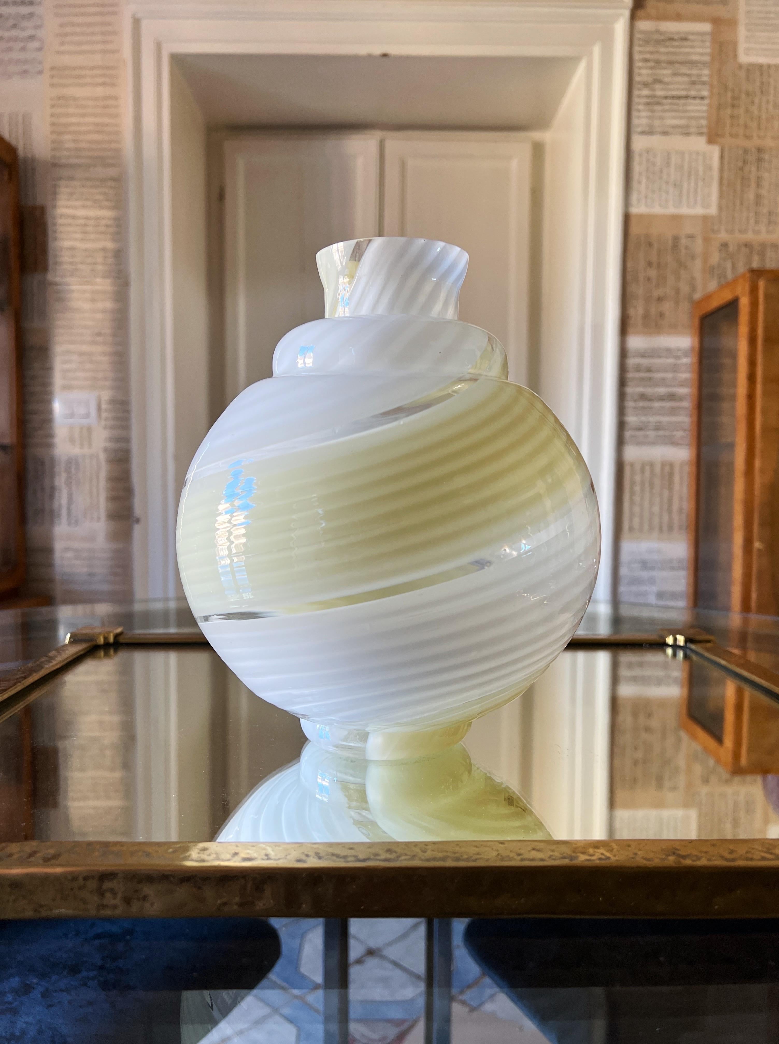 Mid century modern Murano glass vase. Its unique in its kind with its bubble shape design and striped glass.