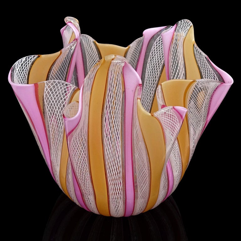 Beautiful vintage Murano hand blown pink, orange, and white ribbons Italian art glass handkerchief / fazzoletto vase. Attributed to the Fratelli Toso company. The vase is made with pink and orange 