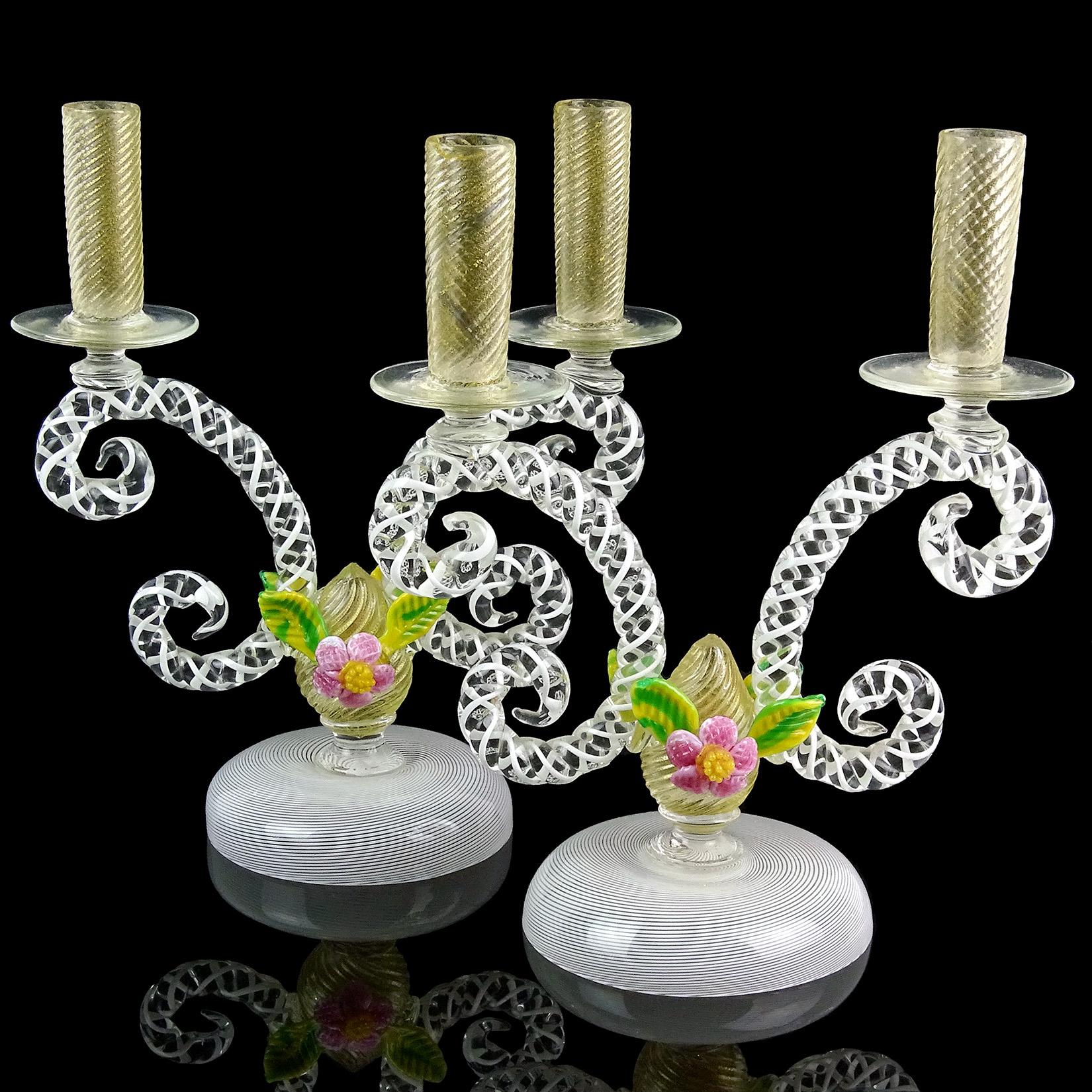 Gorgeous pair of large antique Murano hand blown Filigrana ribbons with gold flecks and flower accents Italian art glass double candlesticks / candelabra. The holders have scroll decoration arms, with white ribbons intertwined, center with gold leaf