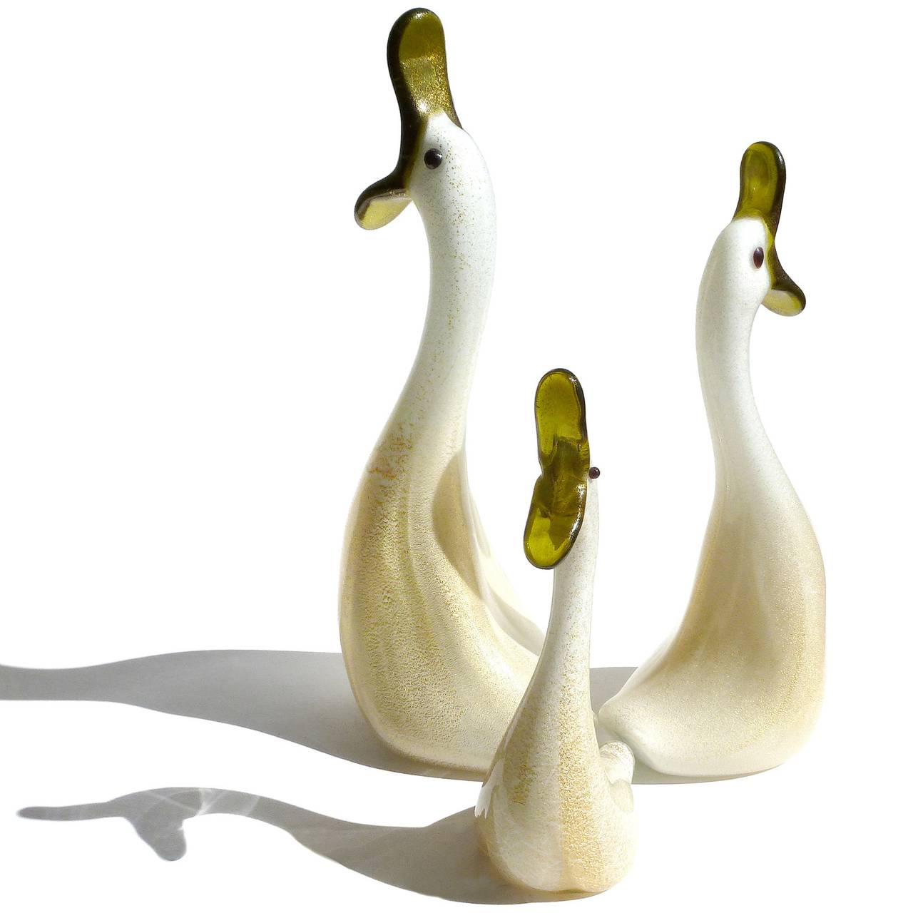 Adorable vintage Murano hand blown white and gold flecks Italian art glass duck family figurines / sculptures. These cute birds just make me laugh every time I look at them. Can you just imagine the choir of voices coming out of those beaks! Dad,