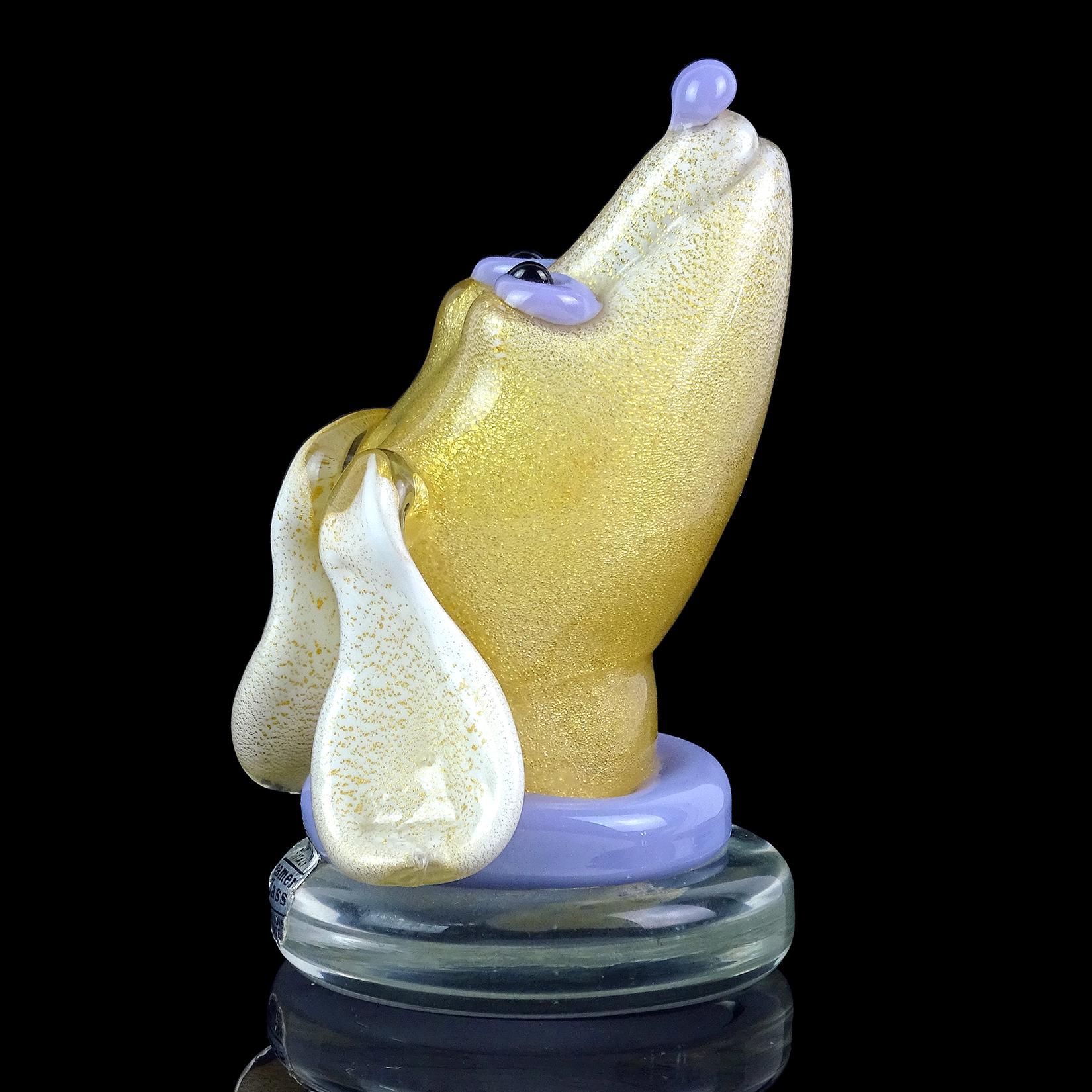 Beautiful and rare, vintage Murano hand blown white, gold flecks and purple accents Italian art glass puppy dog sculpture or paperweight. Documented to designer Alfredo Barbini, circa 1950s. Profusely covered in gold leaf, with clear base. Would