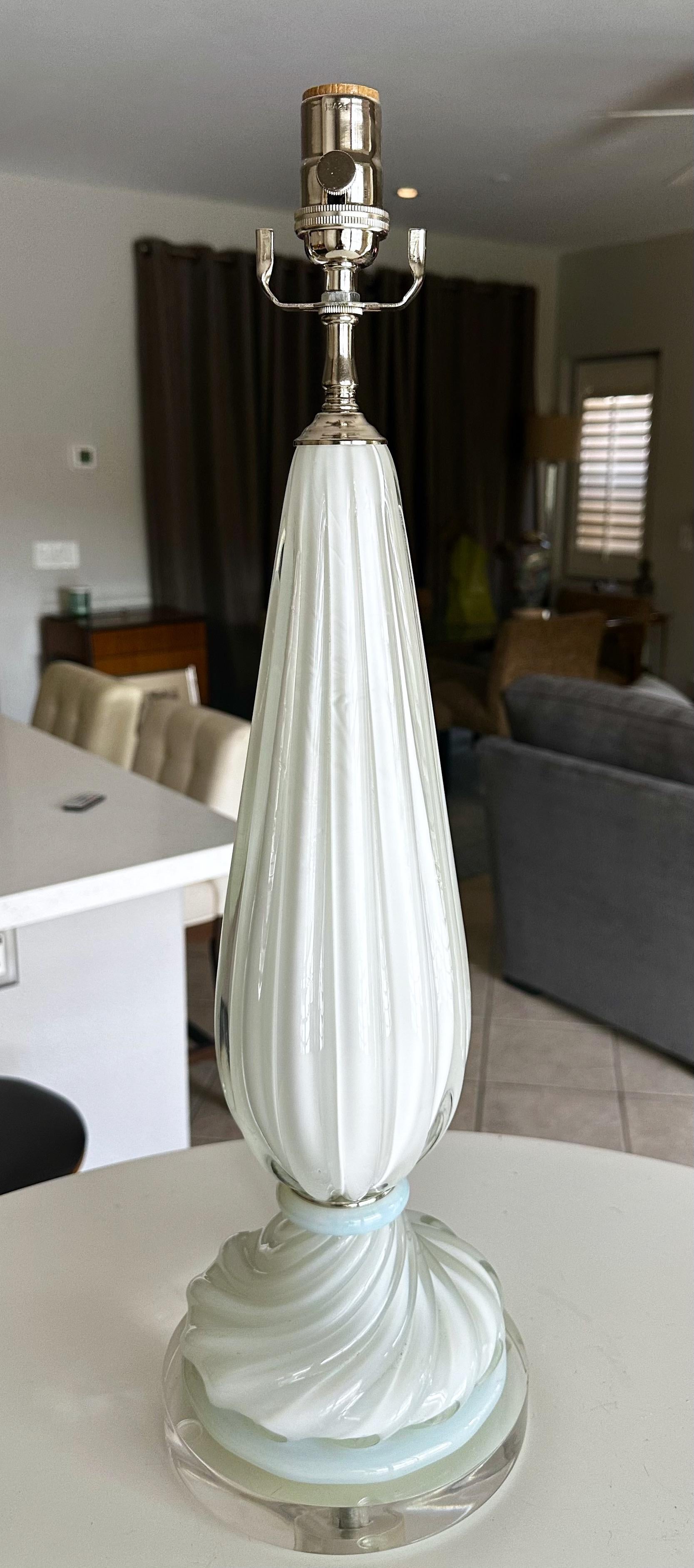 Two tone Murano Italian ribbed glass table lamp, color of the bottom base is light blue opalescence and the top glass portion white cased. Lamp is mounted on an acrylic base. Newly wired for US with new nickel fittings including 3 way socket and