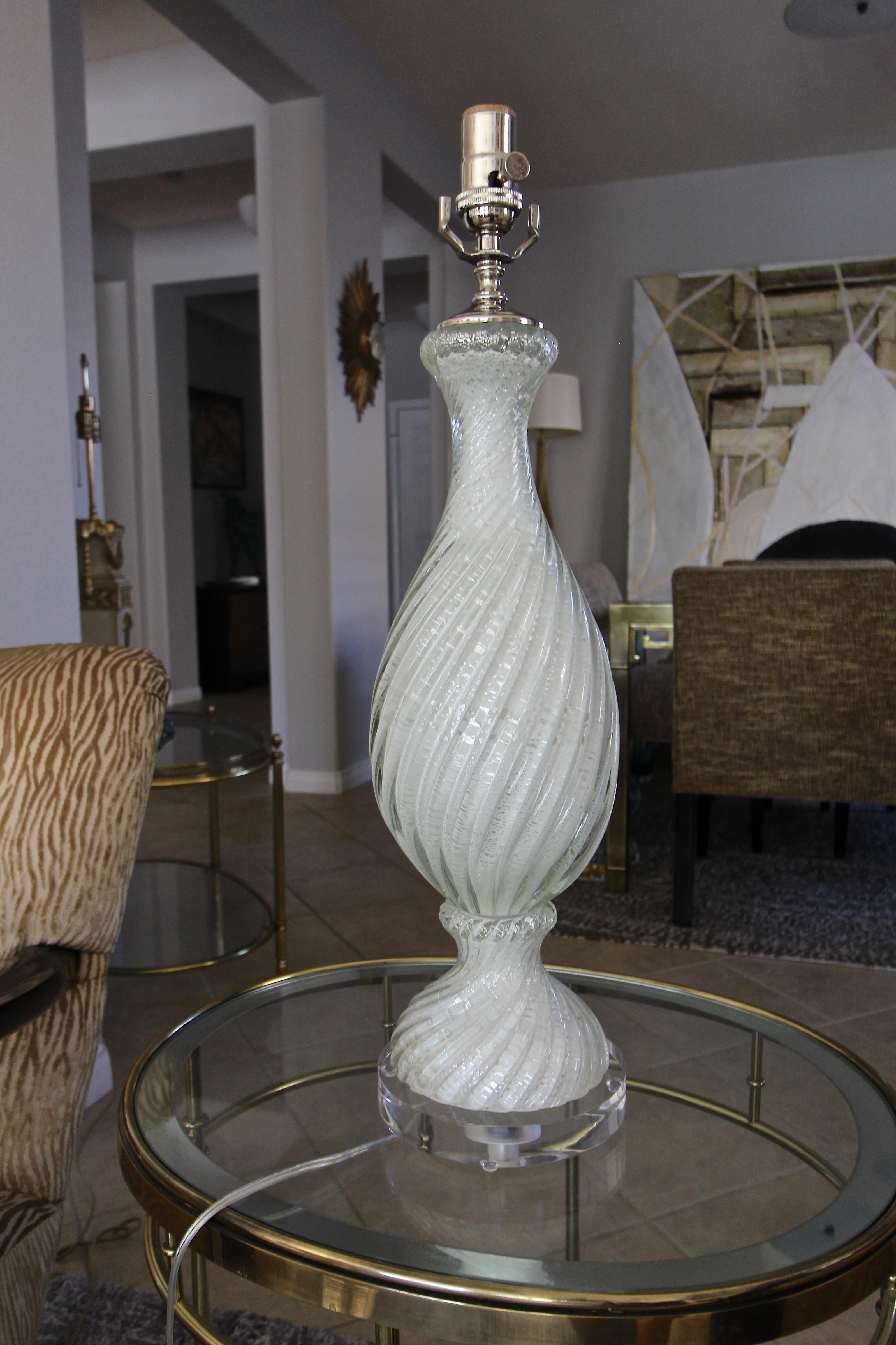 Murano Italian hand blown white twisted glass table lamp with silver mica flecks throughout on custom acrylic base. The white glass has very faint greenish tint. Rewired with all new polished nickel fittings including new three way socket and cord.