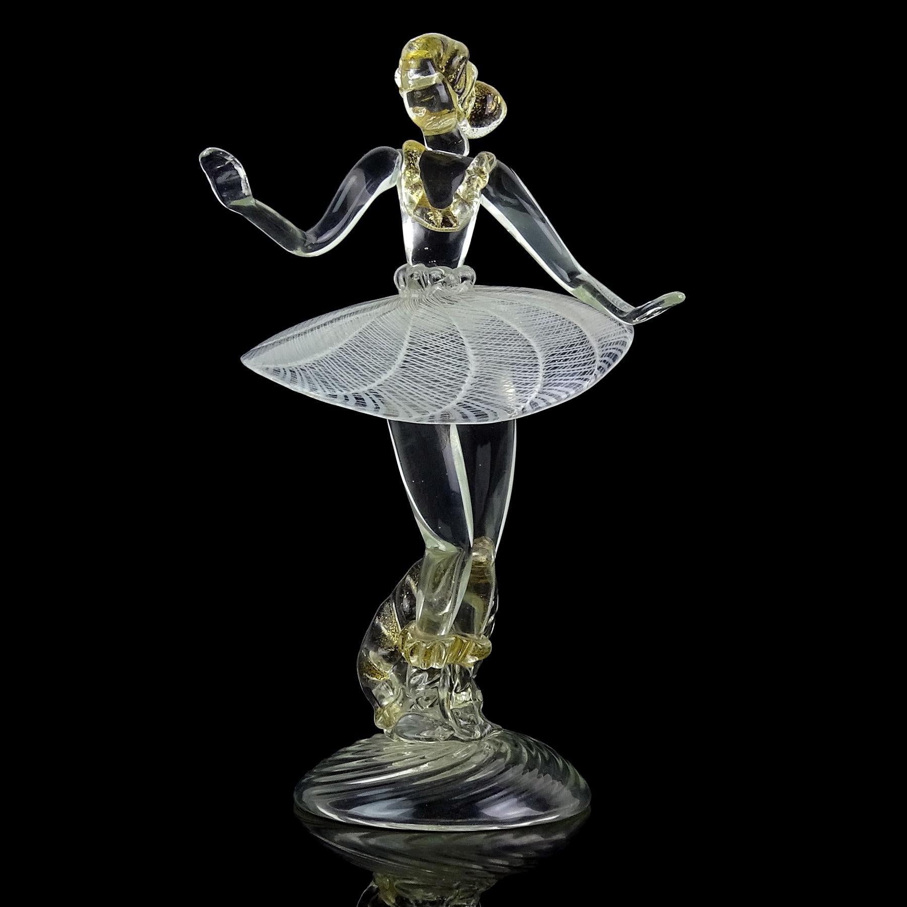 Beautiful and unique, vintage Murano hand blown Italian art glass dancing ballerina sculpture with gold flecks accents and white Zanfirico ribbons skirt. Created in the manner of the Seguso Vetri d'Arte and Salviati companies. She has gold leaf on