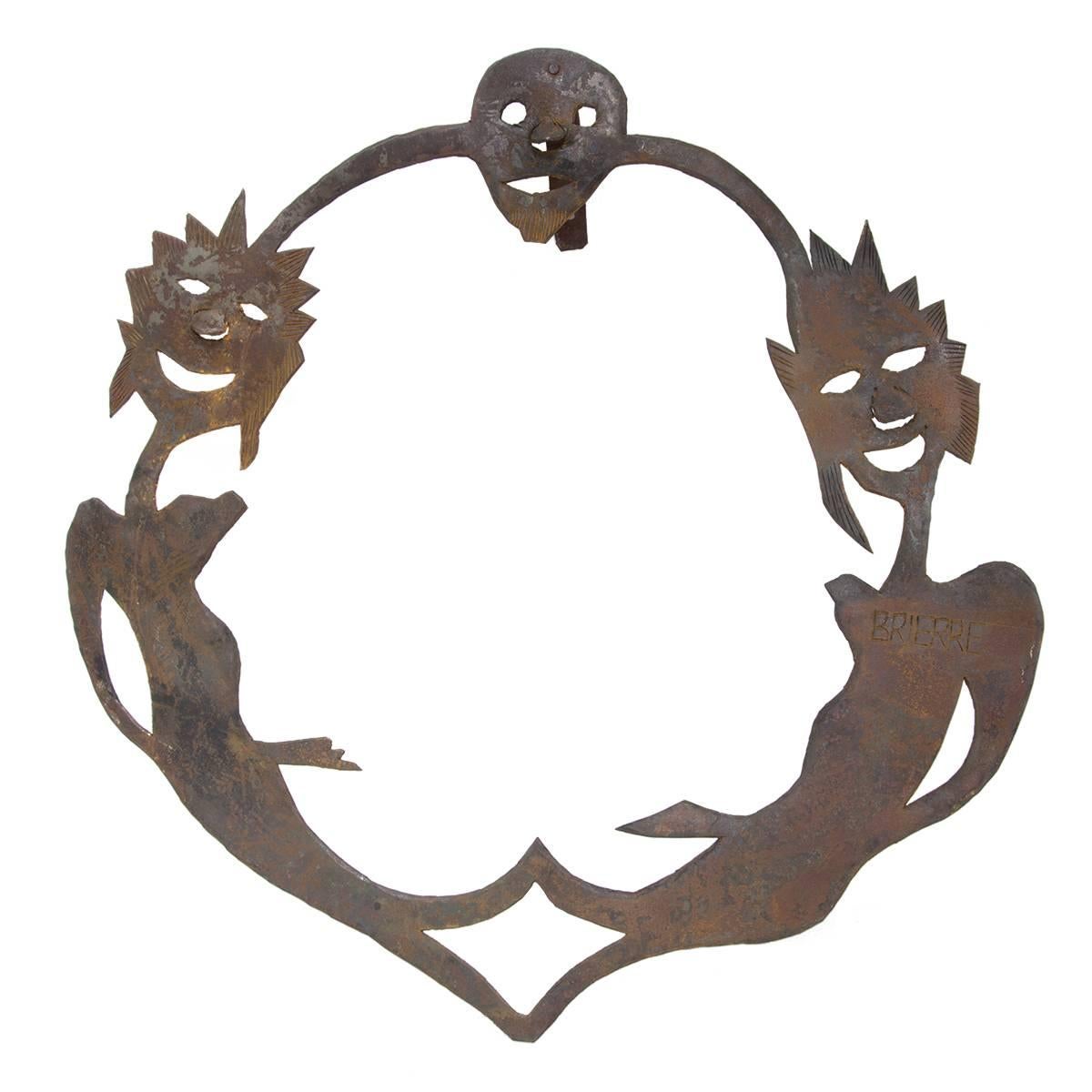 Murat Brierre or Murat Briere (1938–1988) was one of Haiti's principal metal sculptors. He was influenced by George Liautaud, but his work acquired its own, highly experimental style, often focusing on multi-faceted and conjoined figures,