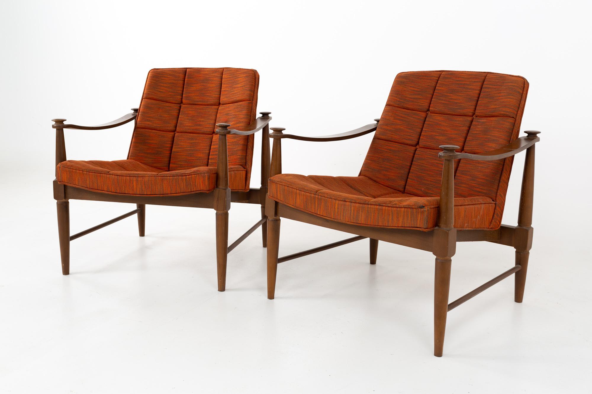 Murphy Miller mid century walnut lounge chairs - pair
These chairs are 26 wide x 29 deep x 29.5 inches high, with a seat height of 16 and arm height of 22.5 inches

All pieces of furniture can be had in what we call restored vintage condition.