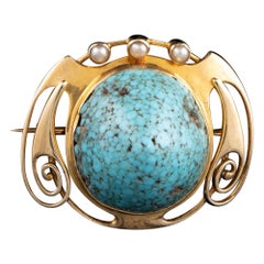 Broche Murrle Bennett de oro de 15 ct y turquesa c1910