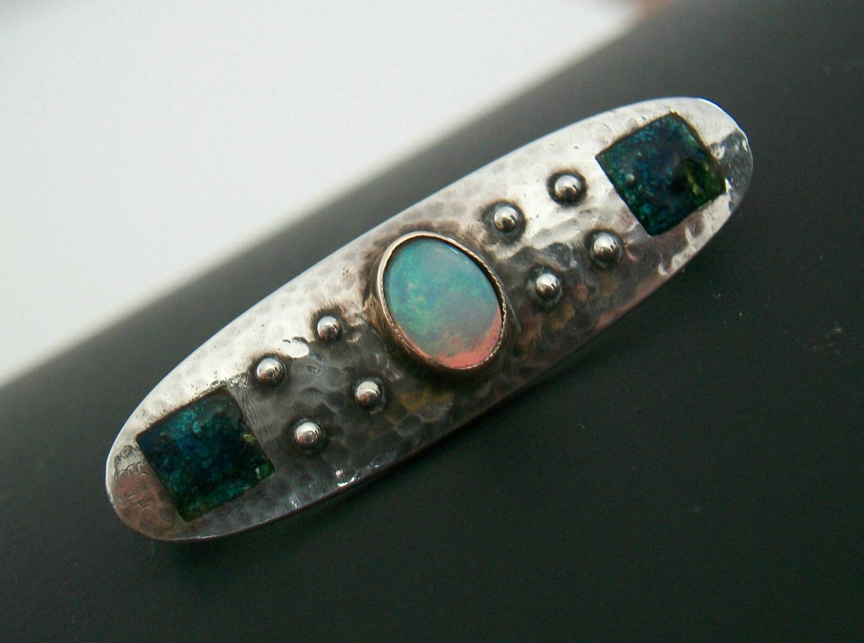 Cabochon Murrle Bennett & Co., Arts & Crafts Silver Brooch with Opal, U.K., circa 1900 For Sale