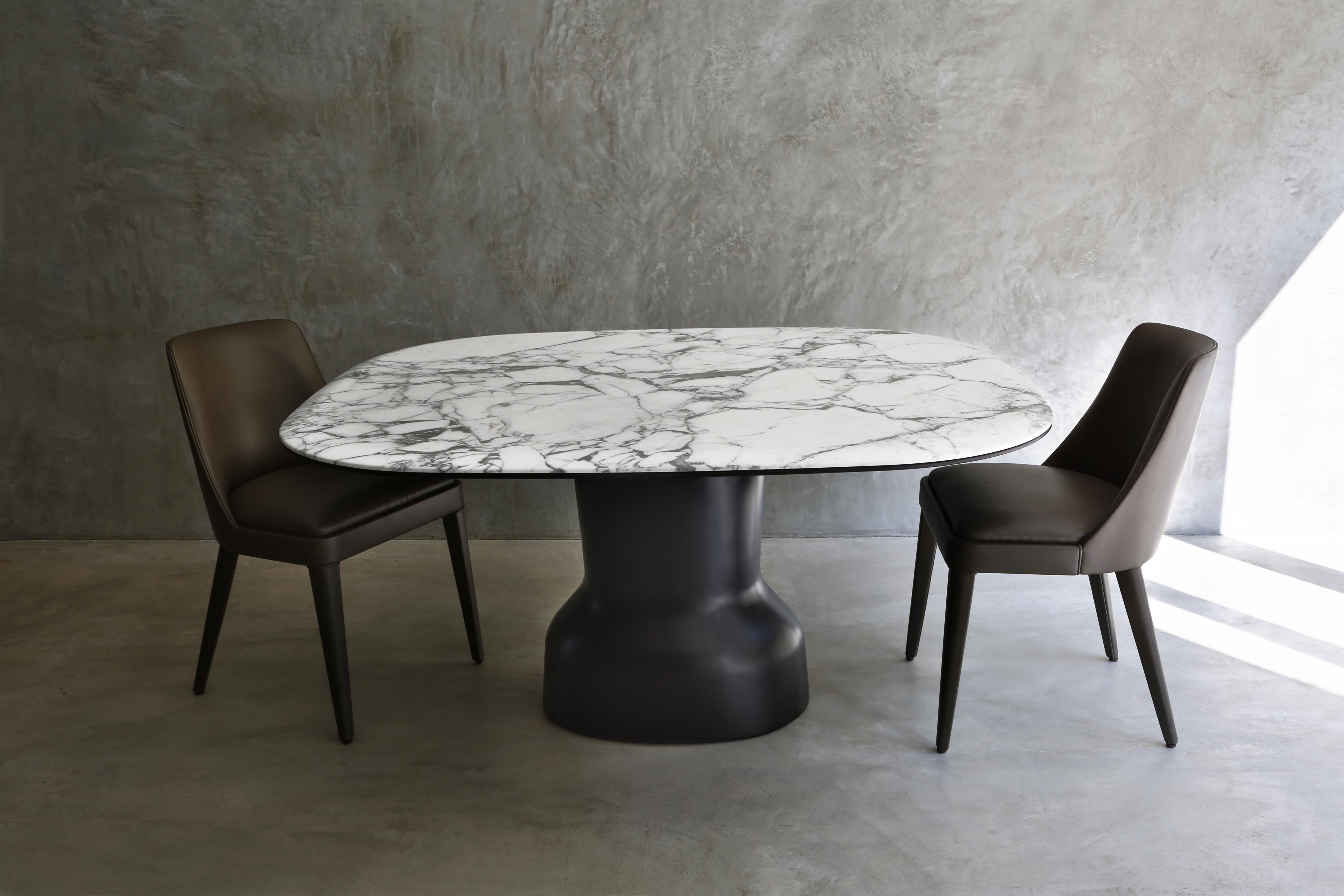 Modern Musa, a sculptural table with top in marble For Sale
