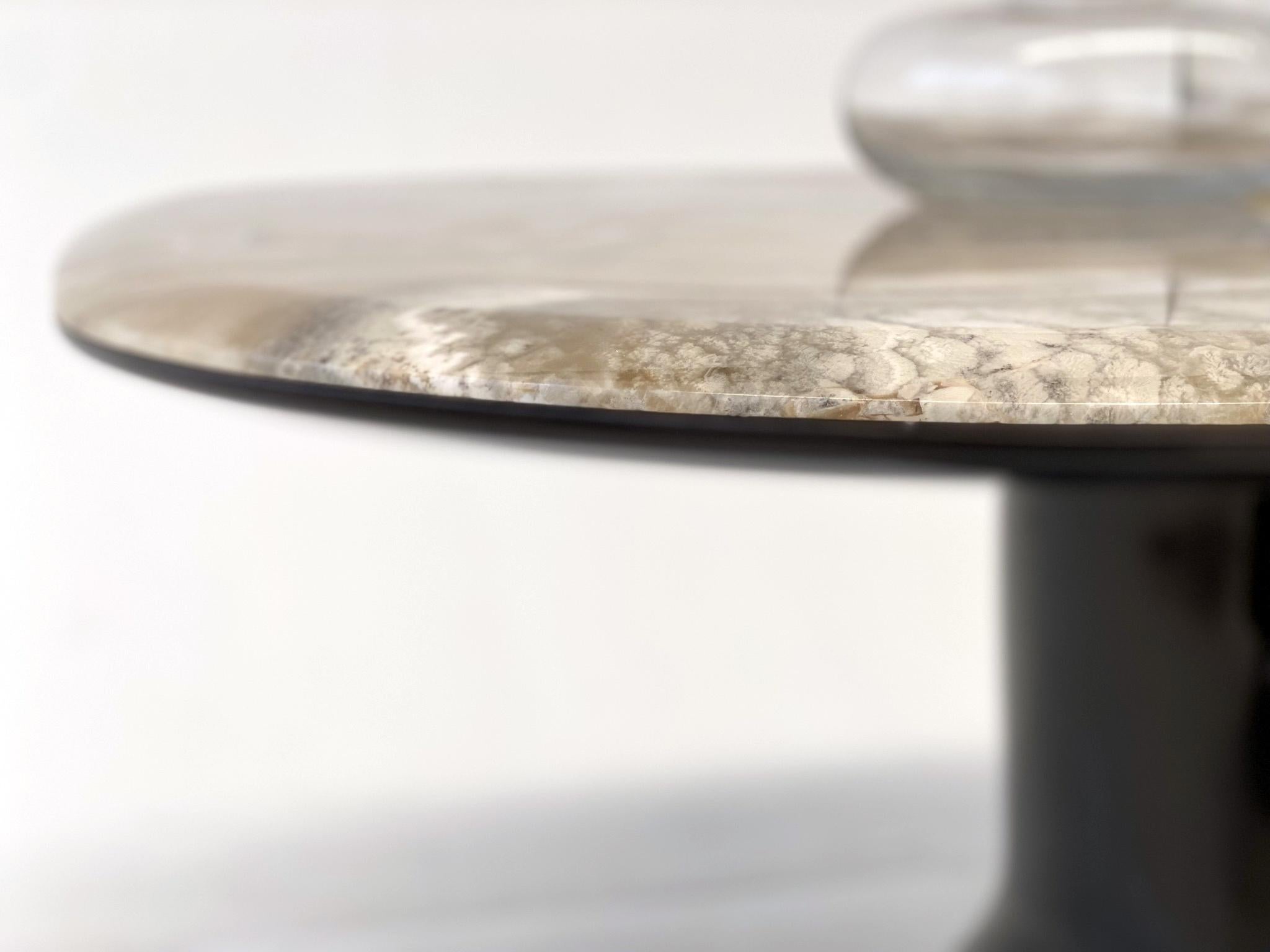 Inspired by the lithesome forms of classical sculpture and by Hans Arp’s smooth and powerful curves, the tables of the Musa series are characterised by the important plinth base with a slight oval section. 

Thanks to an accurate study of joints